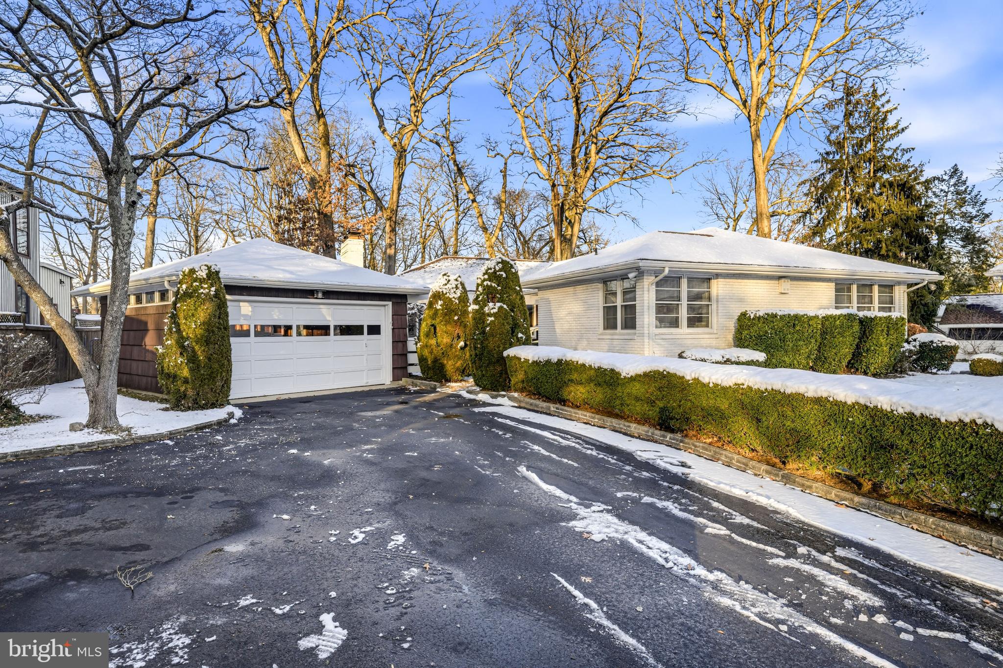 23 Lake Street Bridgeton, NJ 08302 - Photo 14 of 58 a front view of a house with a yard and garage