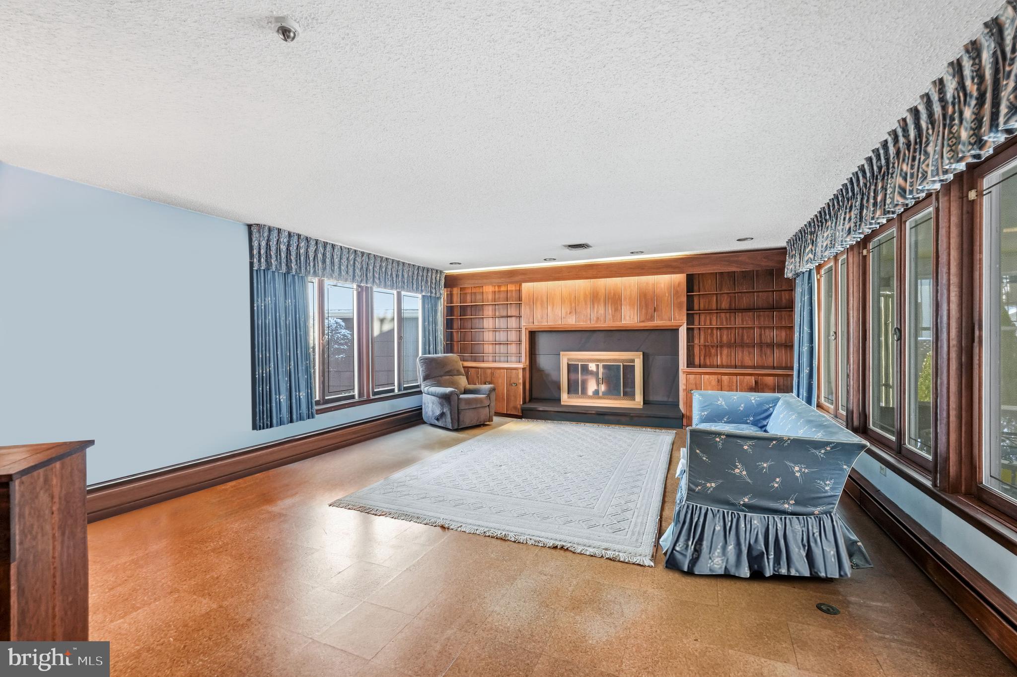 23 Lake Street Bridgeton, NJ 08302 - Photo 24 of 58 a living room with furniture and a fireplace