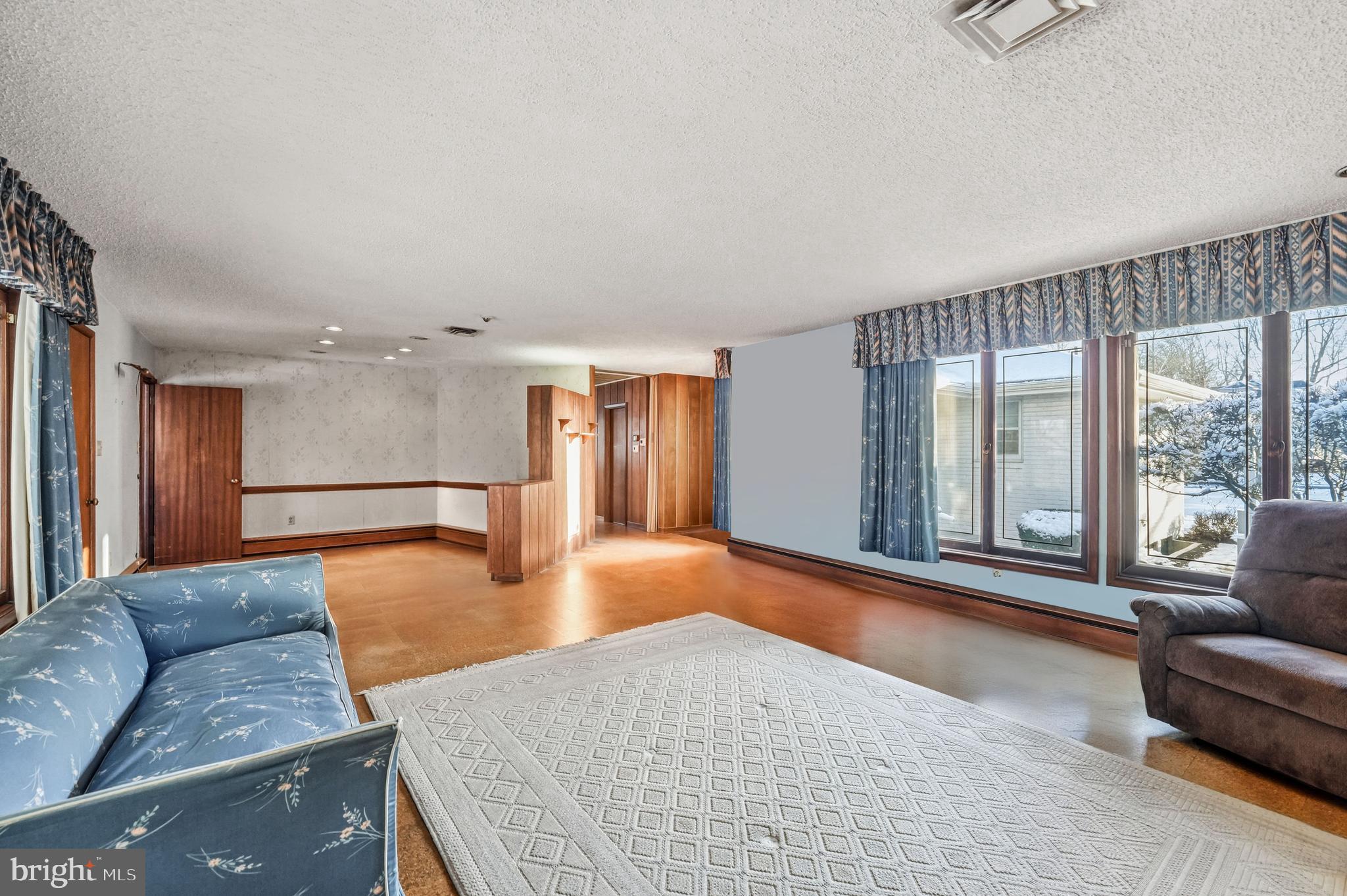 23 Lake Street Bridgeton, NJ 08302 - Photo 25 of 58 a living room with furniture and large windows