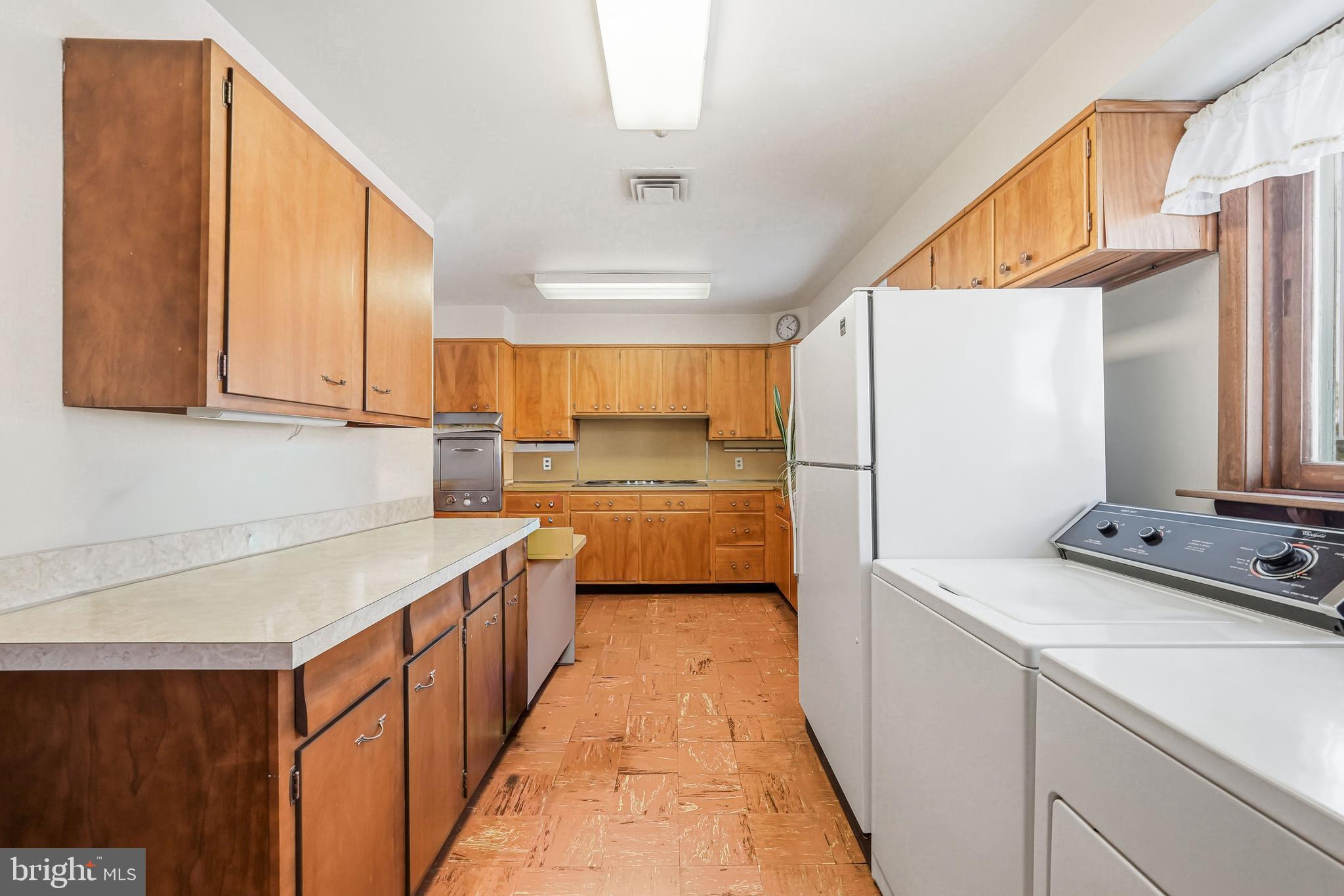 23 Lake Street Bridgeton, NJ 08302 - Photo 28 of 58 a kitchen that has a sink and a stove in it