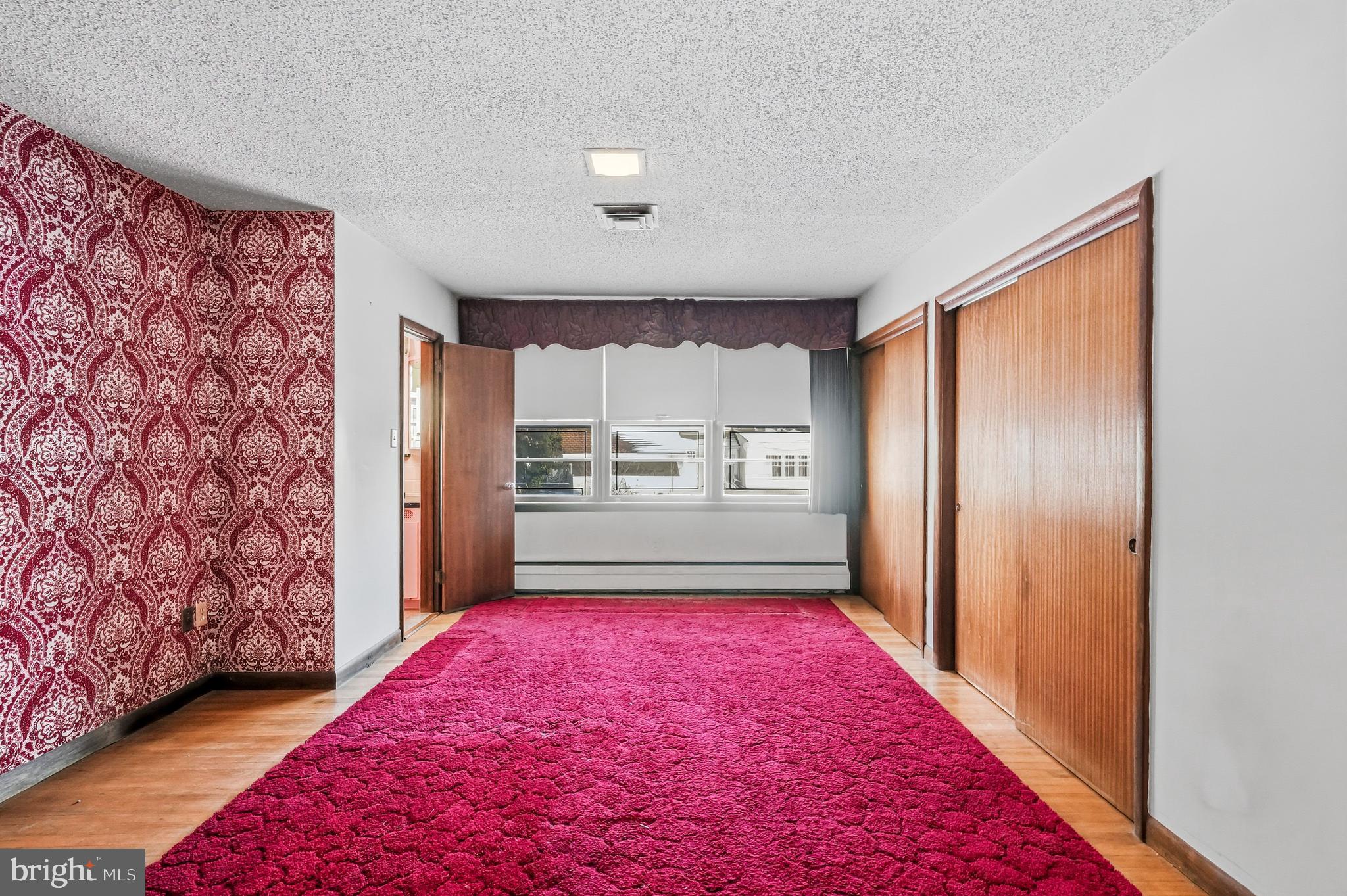 23 Lake Street Bridgeton, NJ 08302 - Photo 36 of 58 a view of a hallway with a workspace