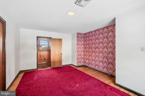 a large white room with windows
