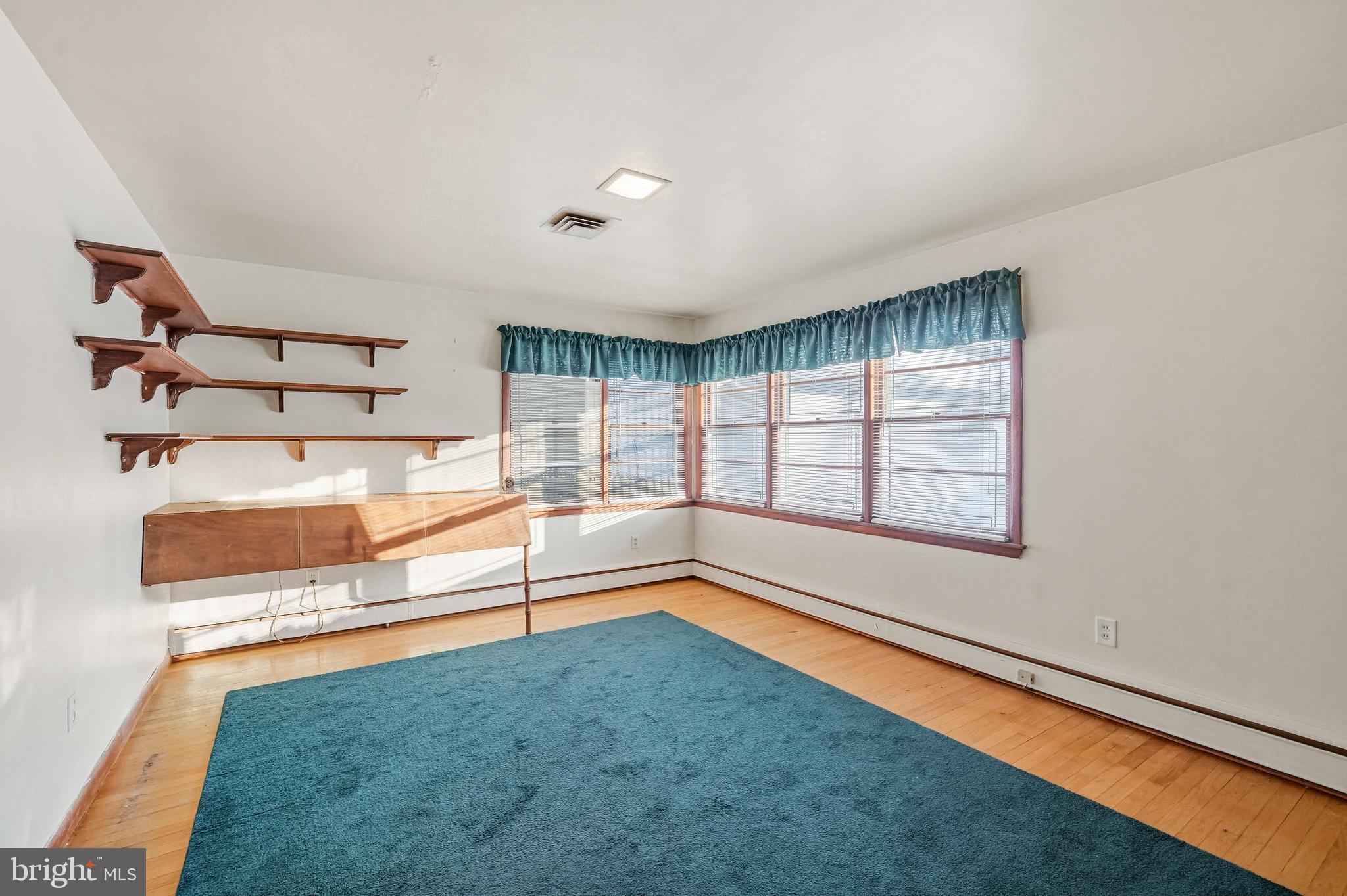 23 Lake Street Bridgeton, NJ 08302 - Photo 40 of 58 an empty room with windows