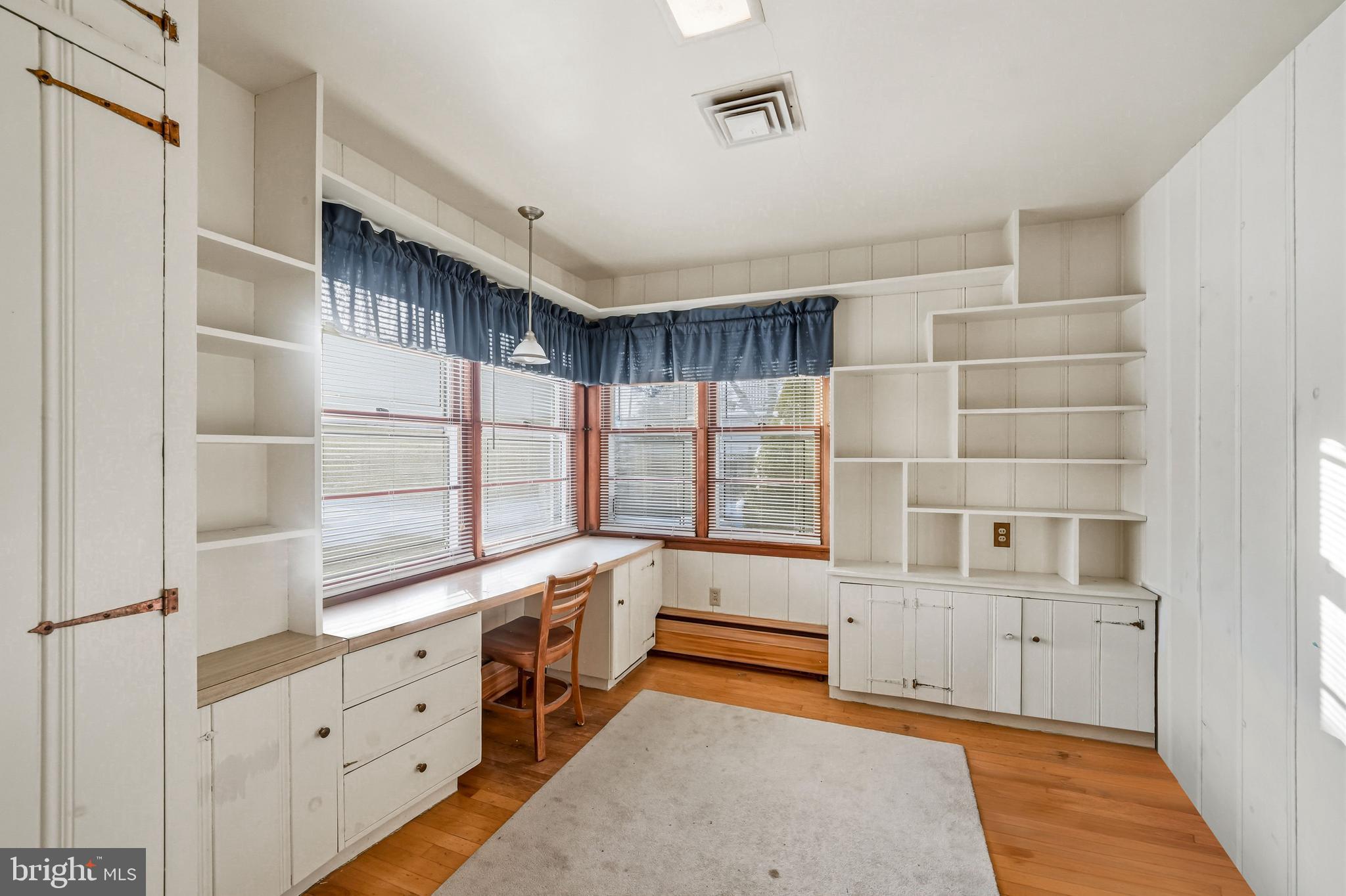 23 Lake Street Bridgeton, NJ 08302 - Photo 42 of 58 a large white room with windows