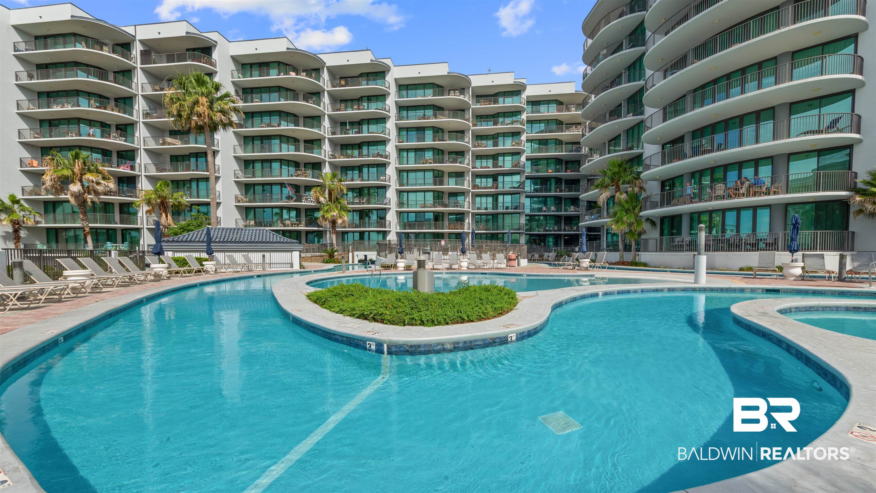 27582 Canal Road, Unit 2207 Orange Beach, AL 36561 - Photo 13 of 25 Community pool featuring a patio