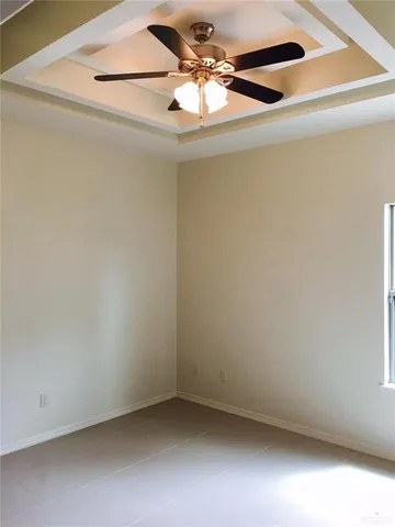 a view of a small space with a fan