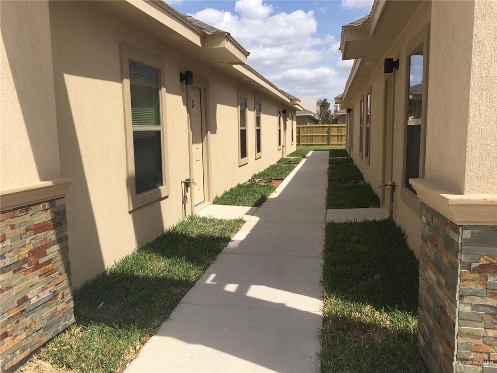 1700 West Smith Drive, Unit 2 Pharr, TX 78577 - Photo 10 of 11 a view of a house with a yard