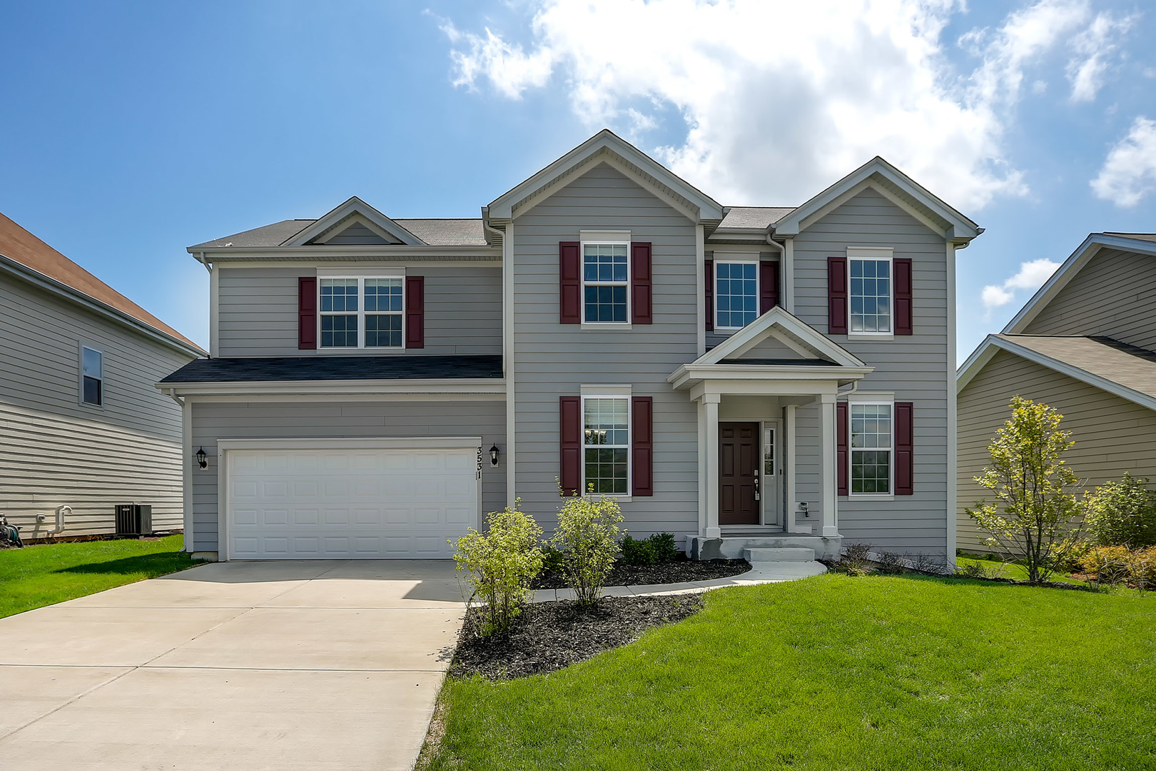 3531 English Prairie Road Elgin, IL 60124 - Photo 1 of 34 a front view of a house with a yard and garage
