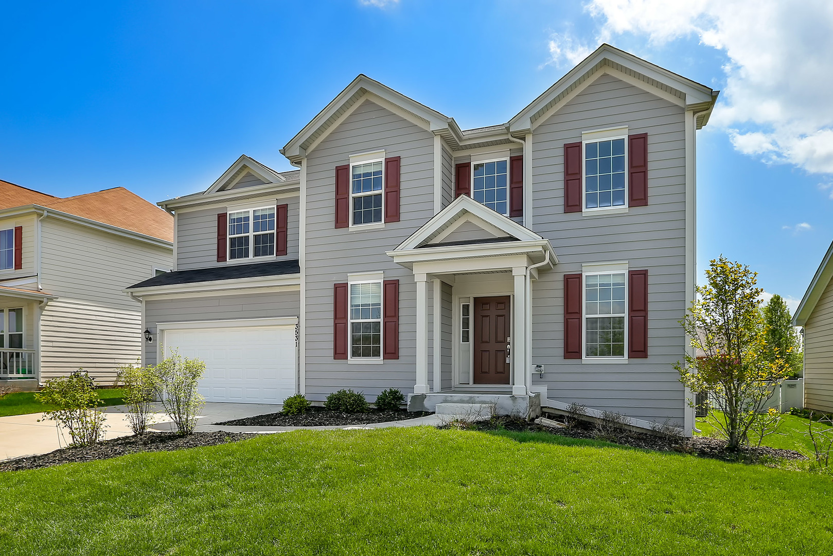 3531 English Prairie Road Elgin, IL 60124 - Photo 2 of 34 a front view of a house with a garden and yard