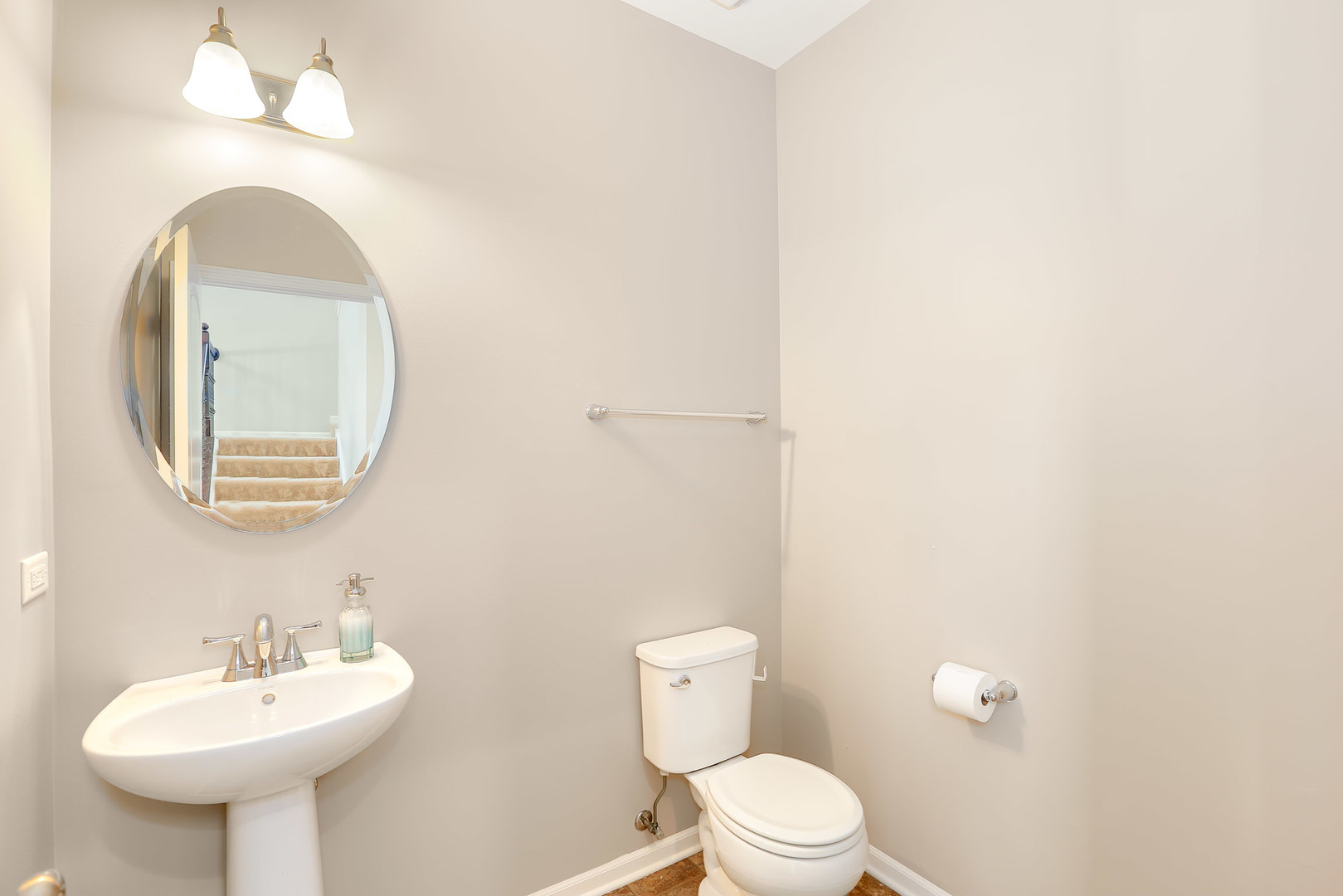 3531 English Prairie Road Elgin, IL 60124 - Photo 17 of 34 a bathroom with a toilet a sink and mirror