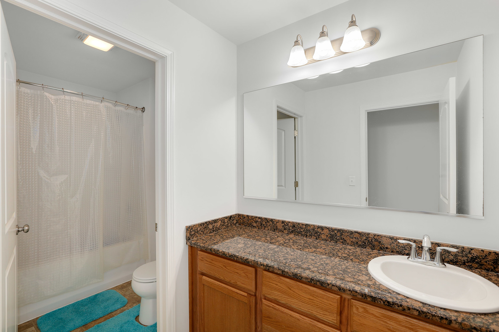 3531 English Prairie Road Elgin, IL 60124 - Photo 24 of 34 a bathroom with a granite countertop sink and a mirror