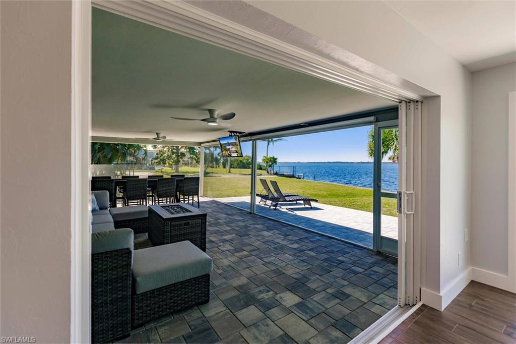 138 Riverview Road Fort Myers, FL 33905 - Photo 18 of 50 View of patio / terrace featuring outdoor dining space and ceiling fan