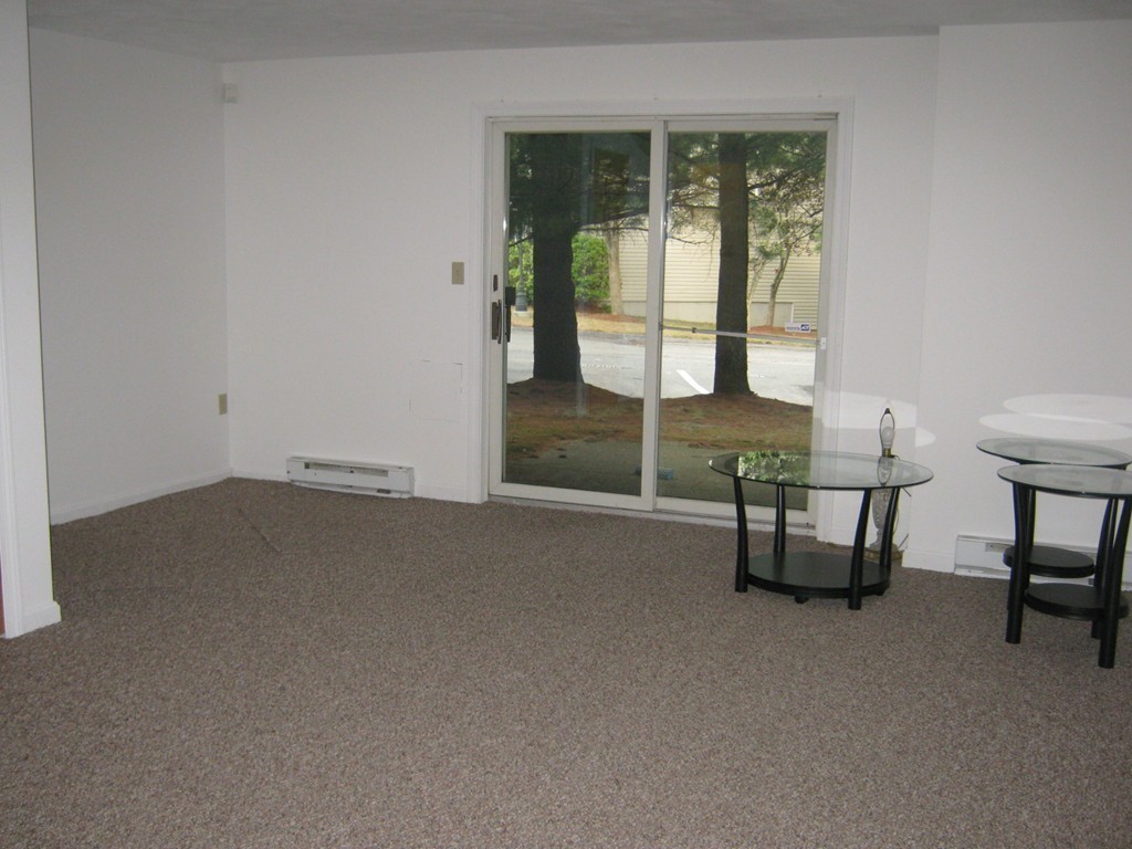 65 Victoria Heights Road, Unit 65 Boston, MA 02136 - Photo 13 of 16 a view of livingroom with furniture and window