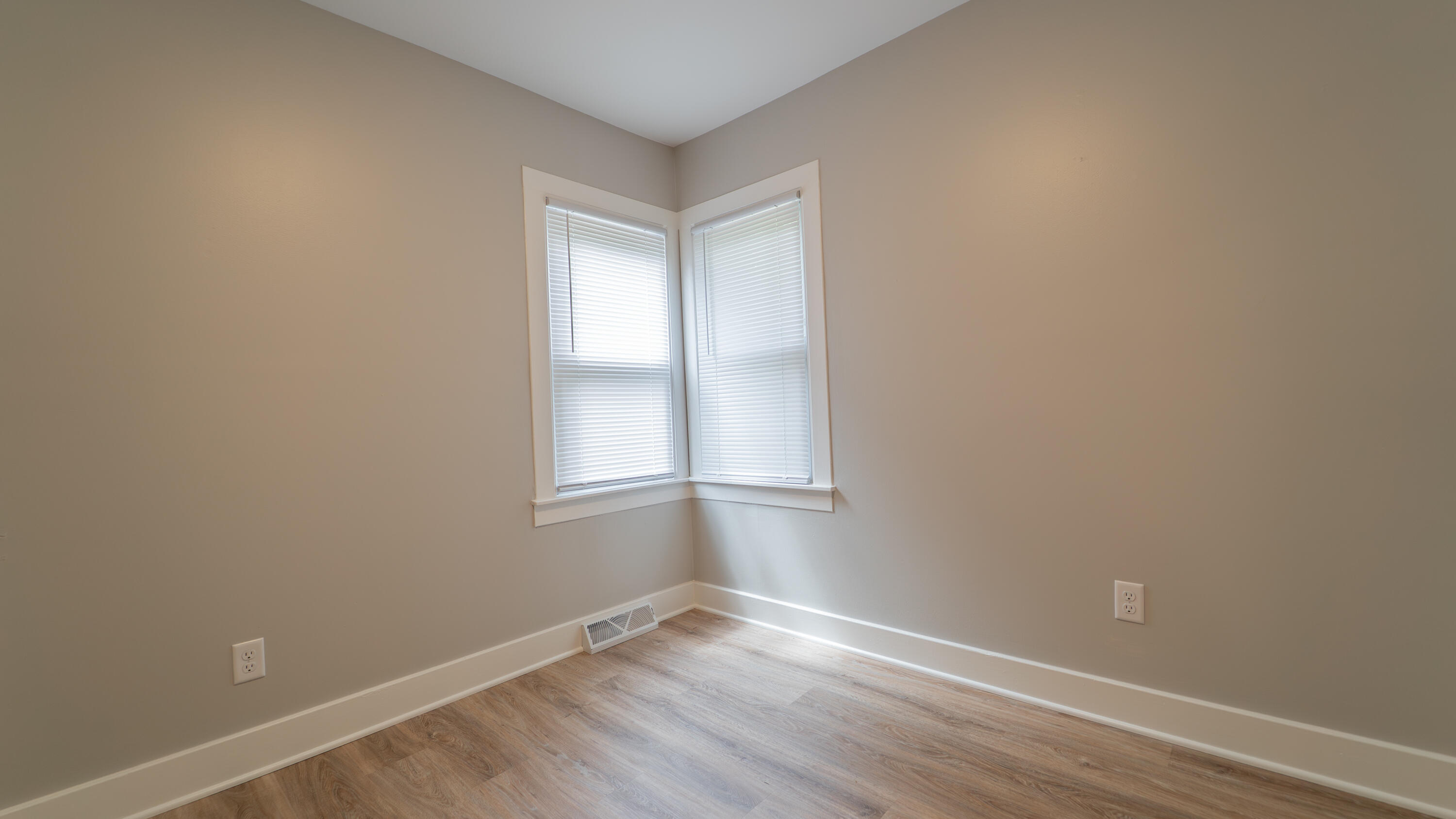 2459 South St Road Valparaiso, IN 46385 - Photo 17 of 24 a view of an empty room with wooden floor and a window