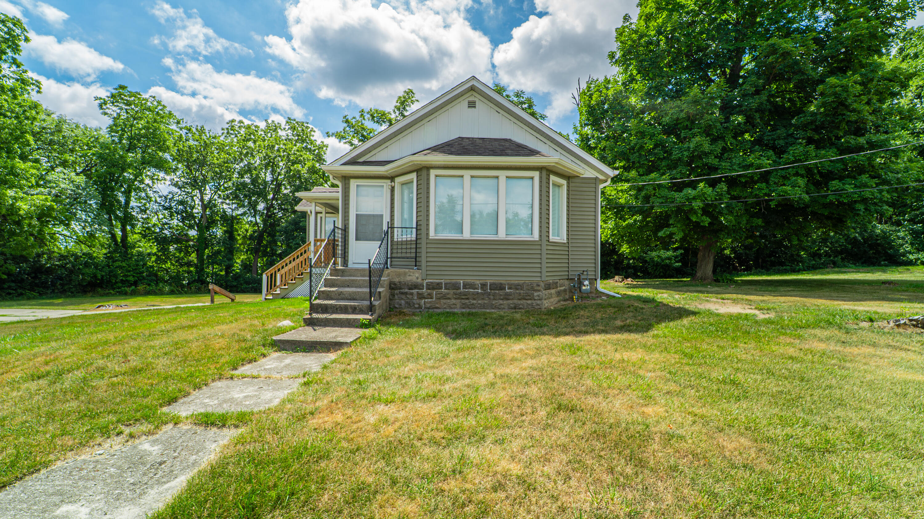 2459 South St Road Valparaiso, IN 46385 - Photo 3 of 24 a front view of a house with a yard