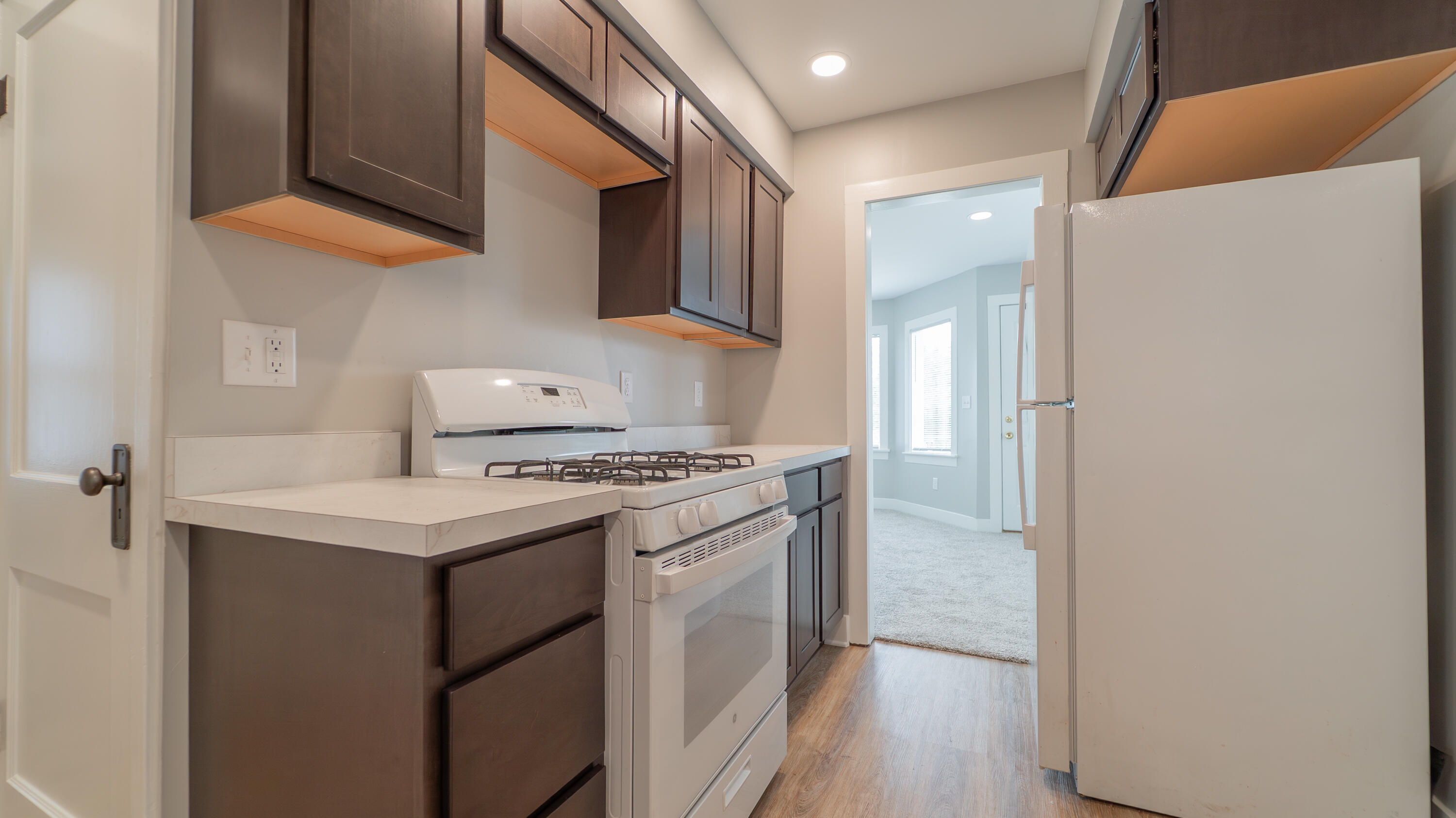 2459 South St Road Valparaiso, IN 46385 - Photo 5 of 24 a kitchen with stainless steel appliances a sink a stove and a refrigerator