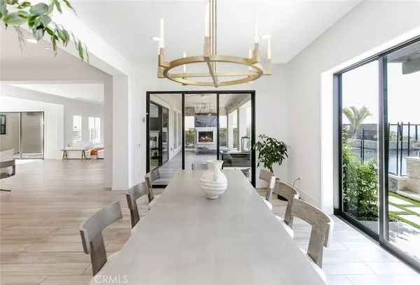 a kitchen with kitchen island granite countertop a sink appliances cabinets and counter space