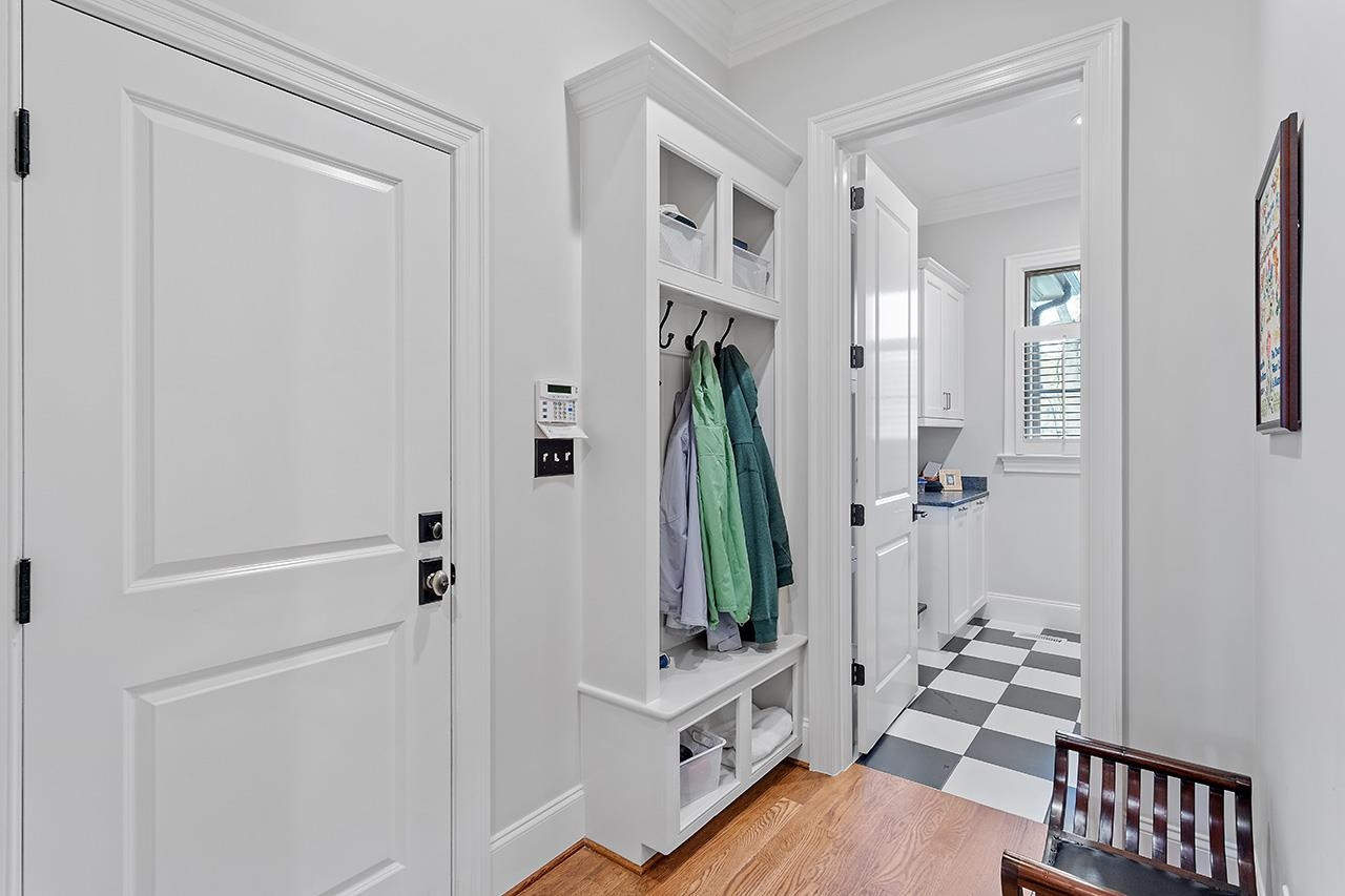 1116 Hunting Ridge Road Raleigh, NC 27615 - Photo 39 of 91 a view of wooden floor and windows in a room
