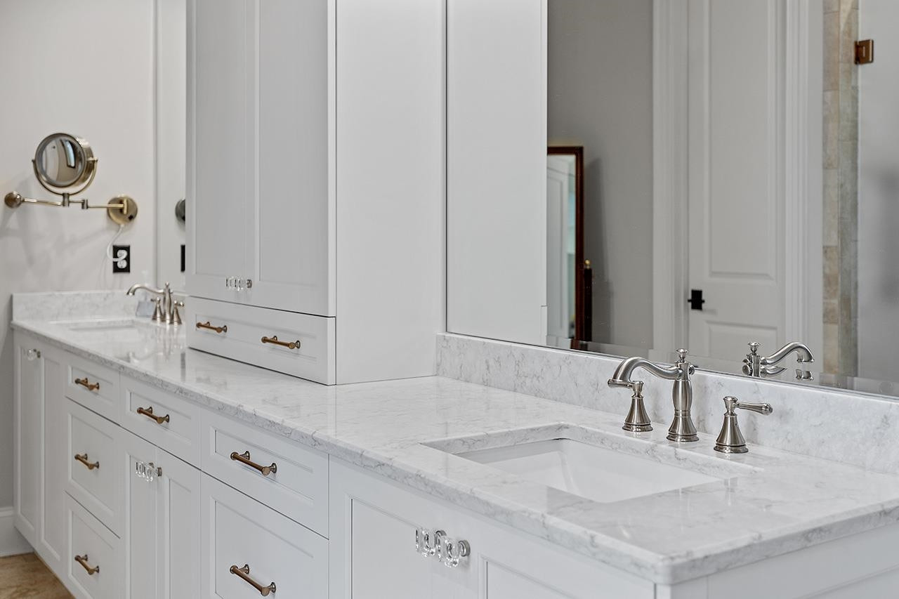 1116 Hunting Ridge Road Raleigh, NC 27615 - Photo 49 of 91 a bathroom with double vanity sink and a mirror