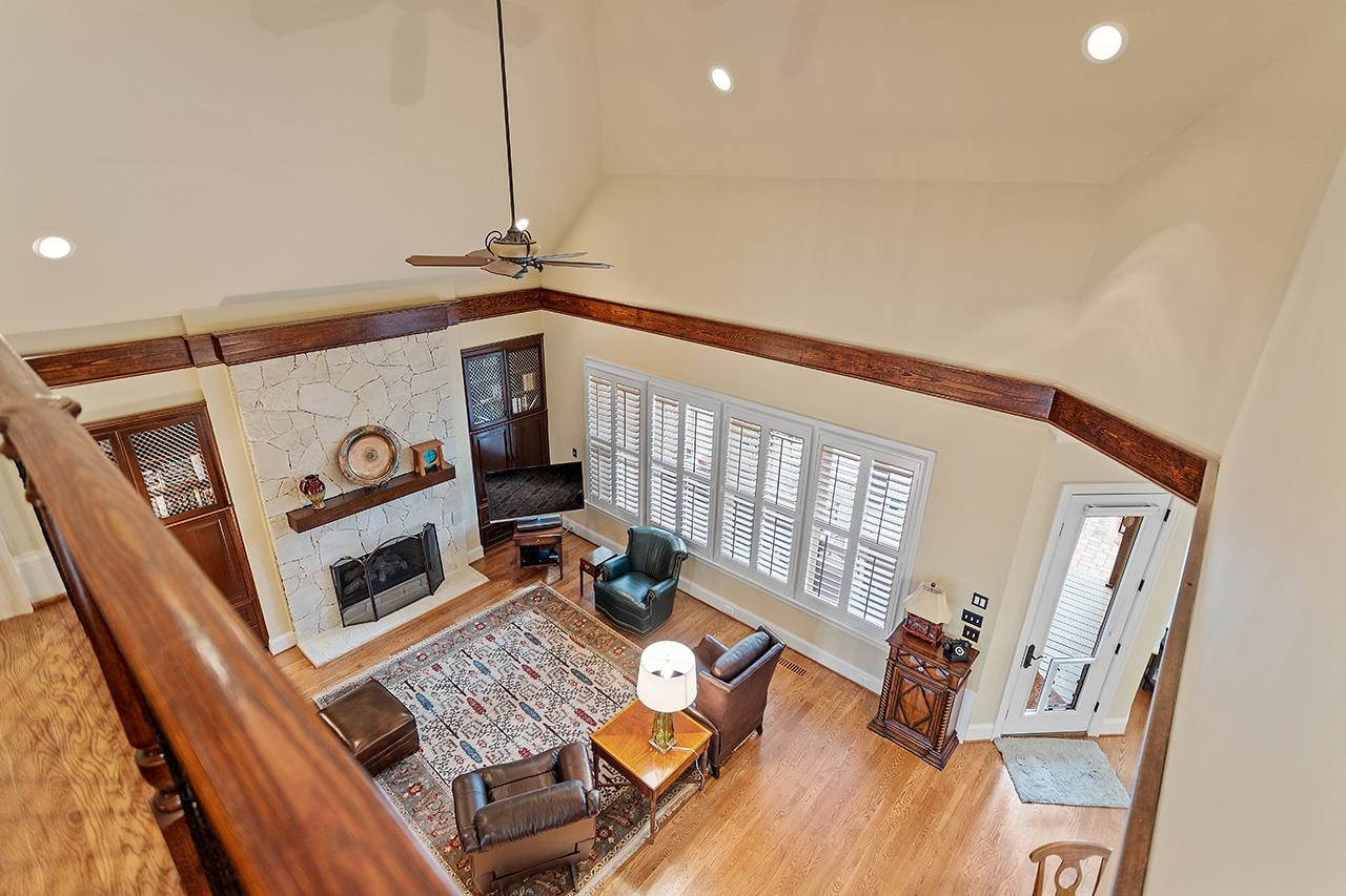 1116 Hunting Ridge Road Raleigh, NC 27615 - Photo 55 of 91 a living room with furniture and a fireplace