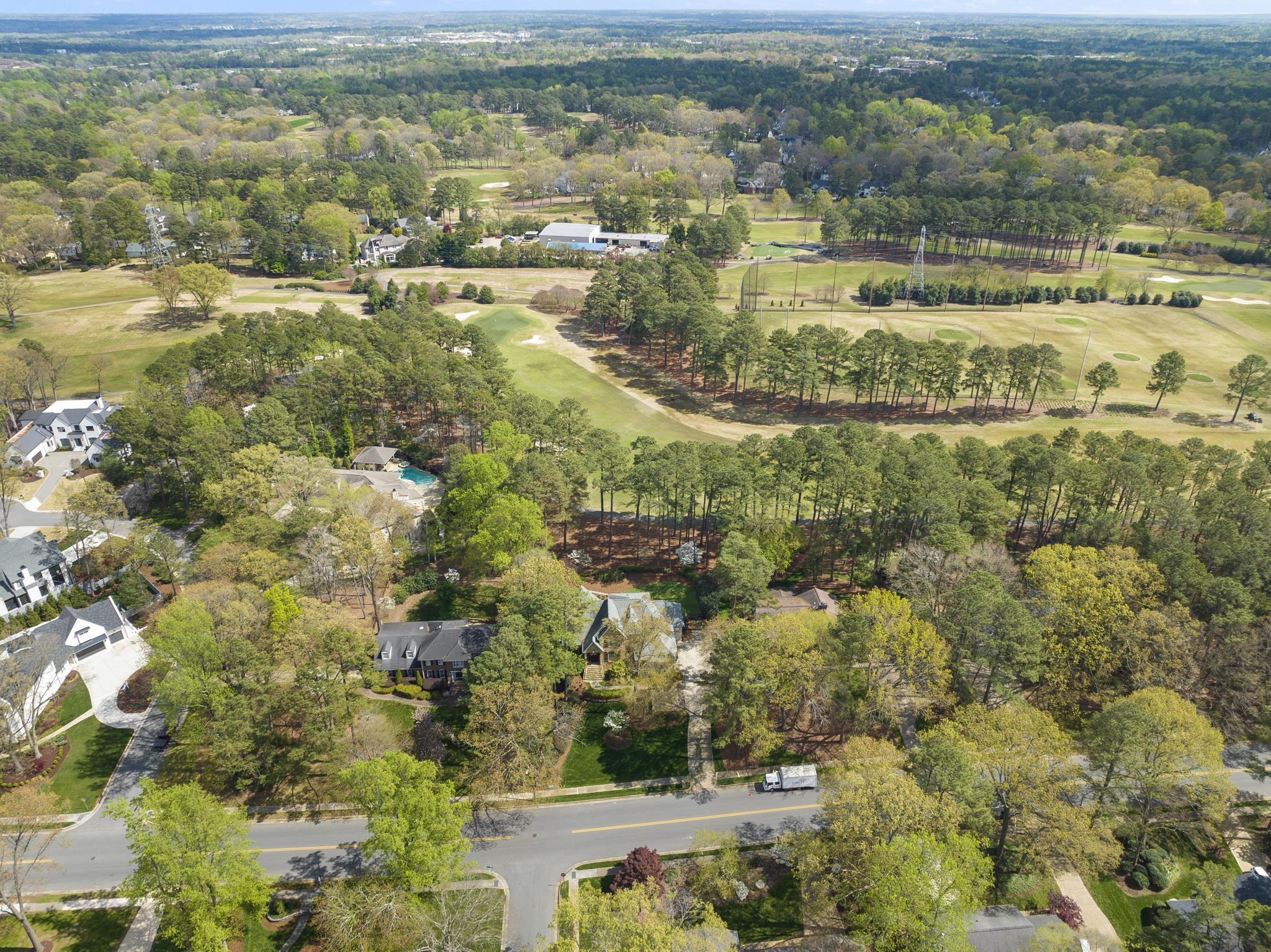 1116 Hunting Ridge Road Raleigh, NC 27615 - Photo 76 of 91 an aerial view of residential houses with outdoor space