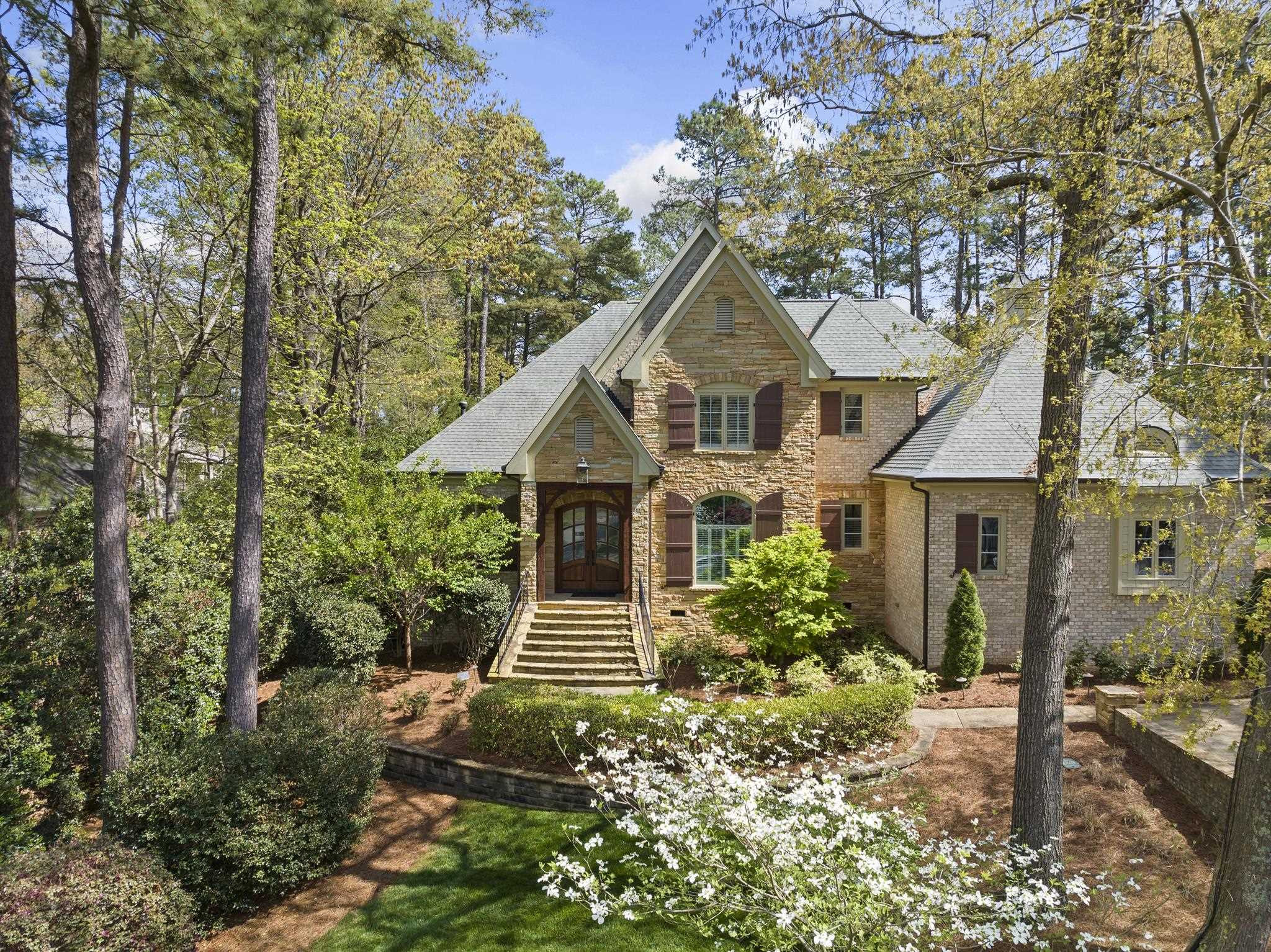 1116 Hunting Ridge Road Raleigh, NC 27615 - Photo 85 of 91 a front view of a house with garden