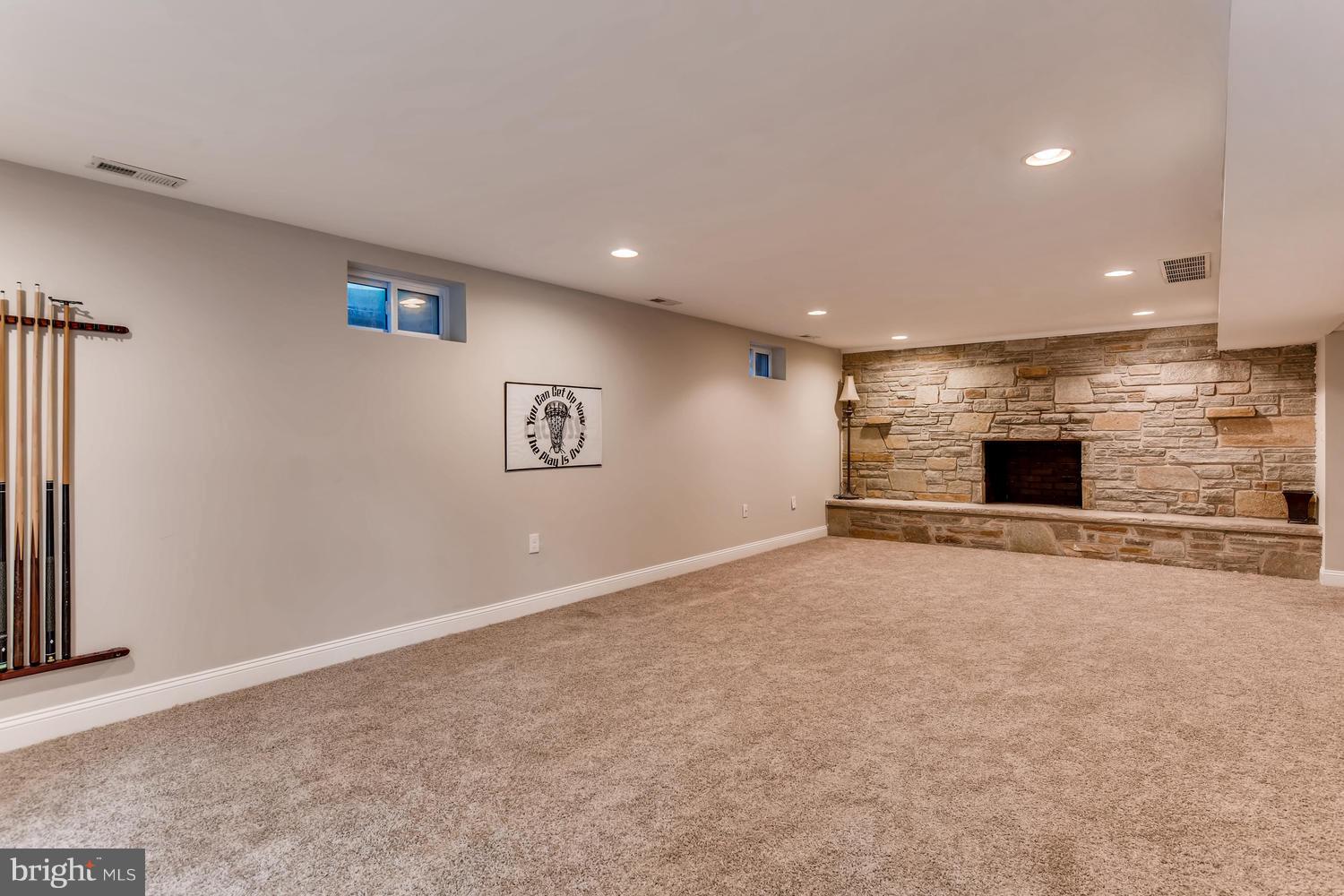 904 Stone Barn Road Towson, MD 21286 - Photo 23 of 30 an empty room with a empty space and windows