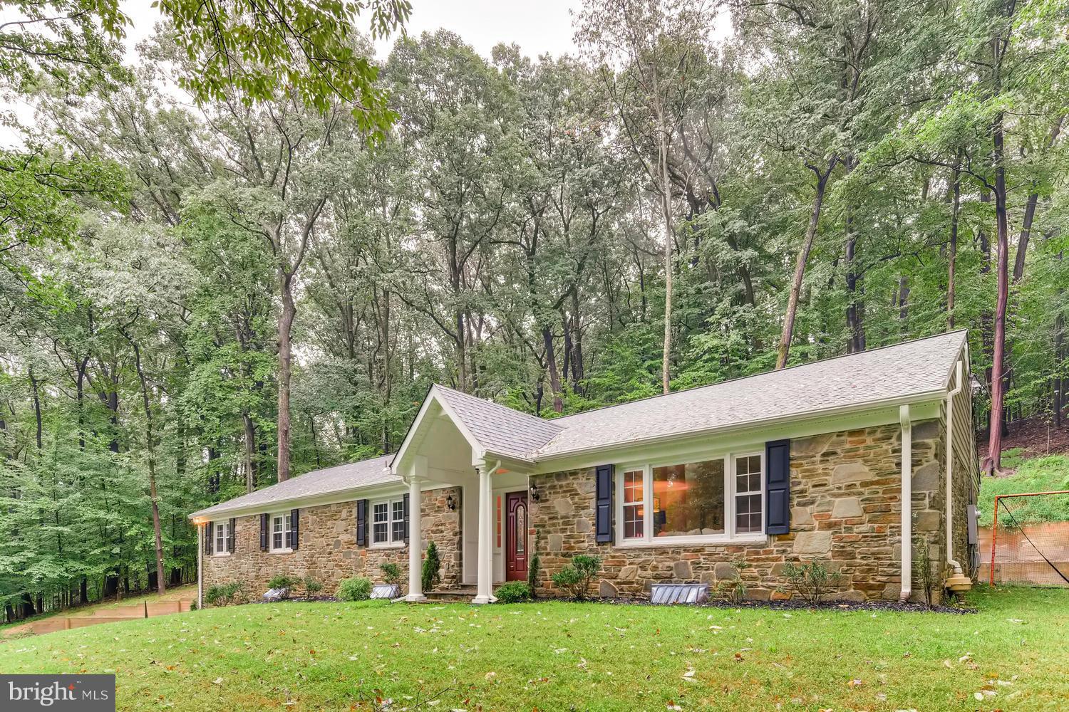 904 Stone Barn Road Towson, MD 21286 - Photo 29 of 30 front view of a house with a yard