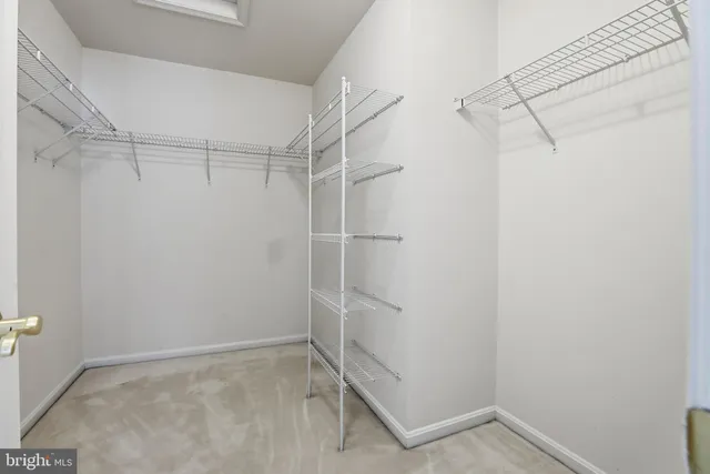 a view of a room with racks on the wall