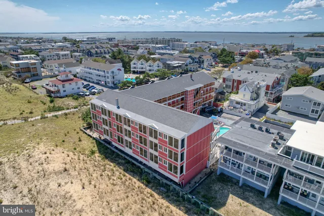 a view of a balcony with wooden floor