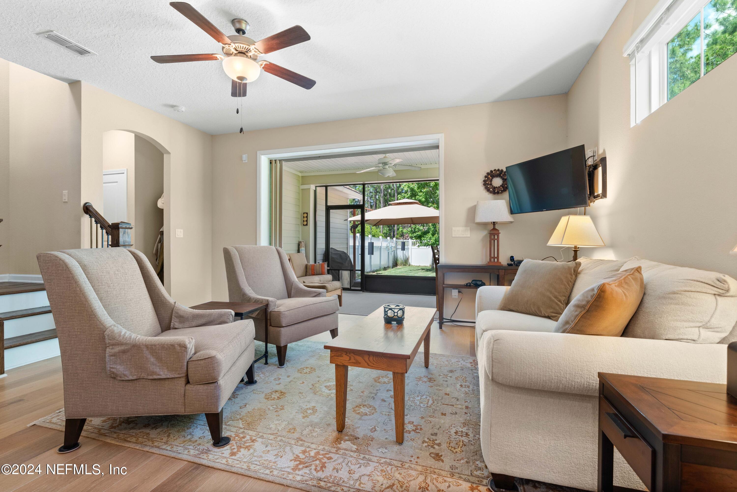 245 Floco Avenue Yulee, FL 32097 - Photo 12 of 38 a living room with furniture and a window