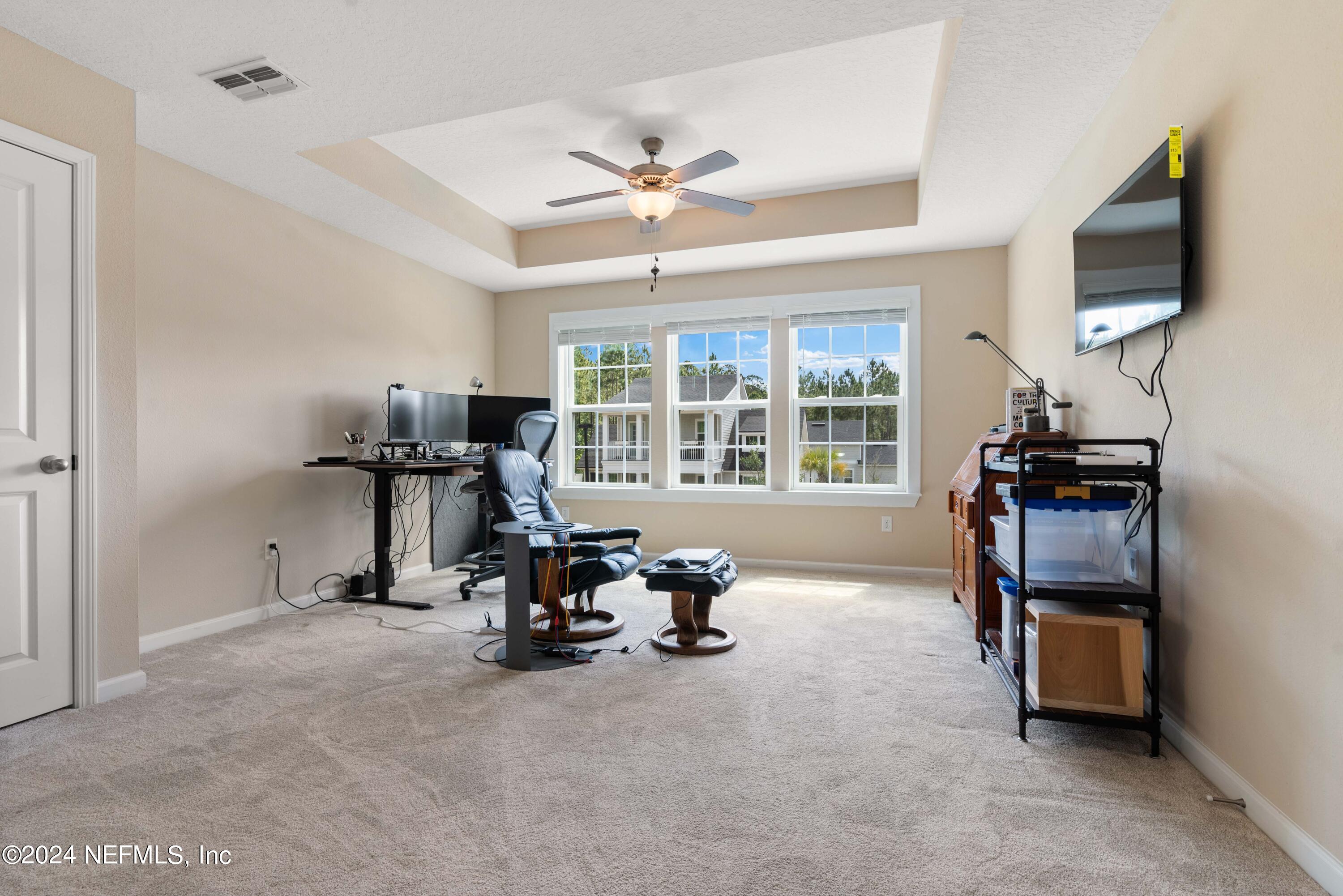 245 Floco Avenue Yulee, FL 32097 - Photo 18 of 38 a view of a livingroom with furniture and a window