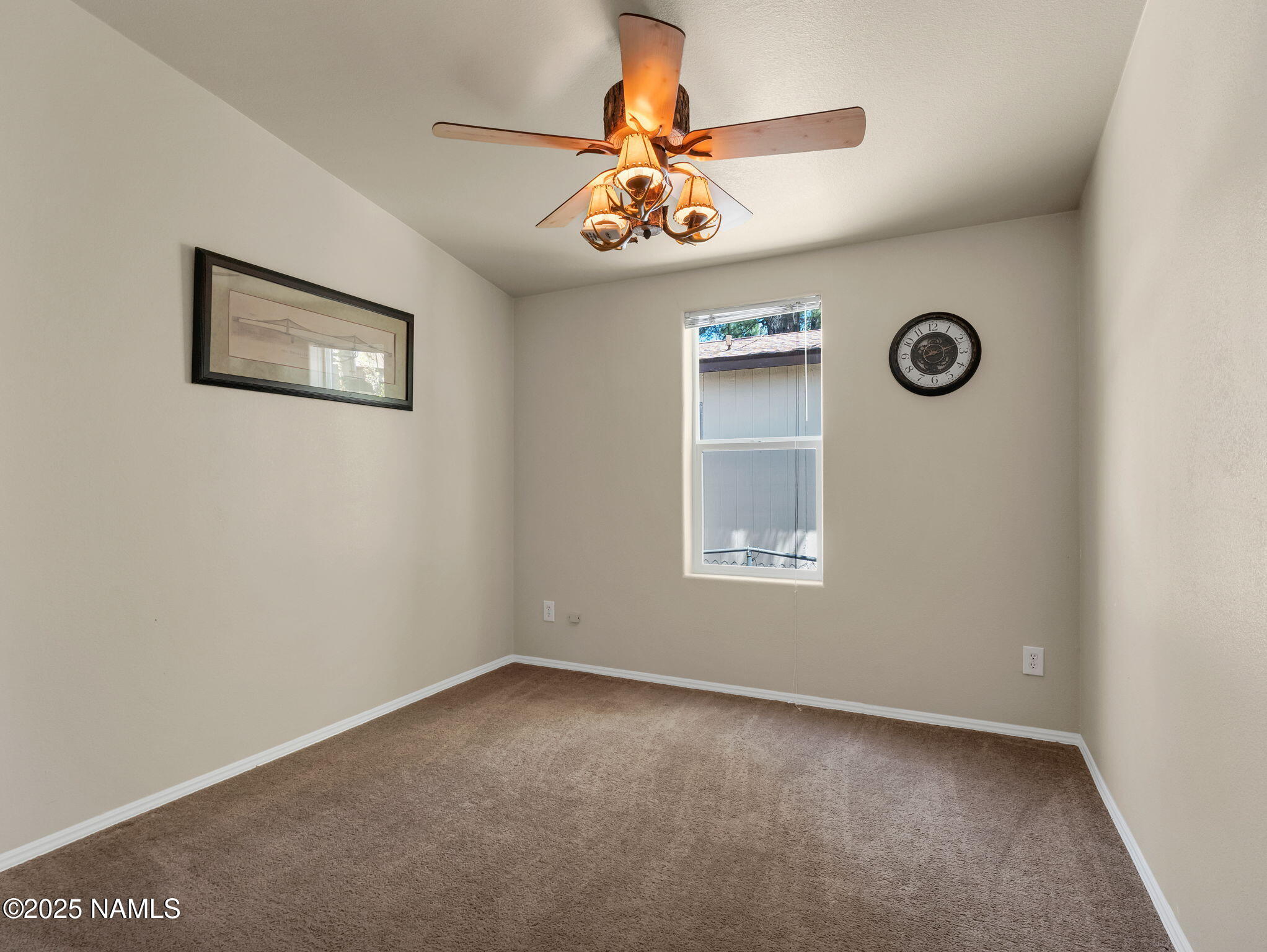 1151 Caribou Road Munds Park, AZ 86017 - Photo 23 of 30 a view of a hallway with a window