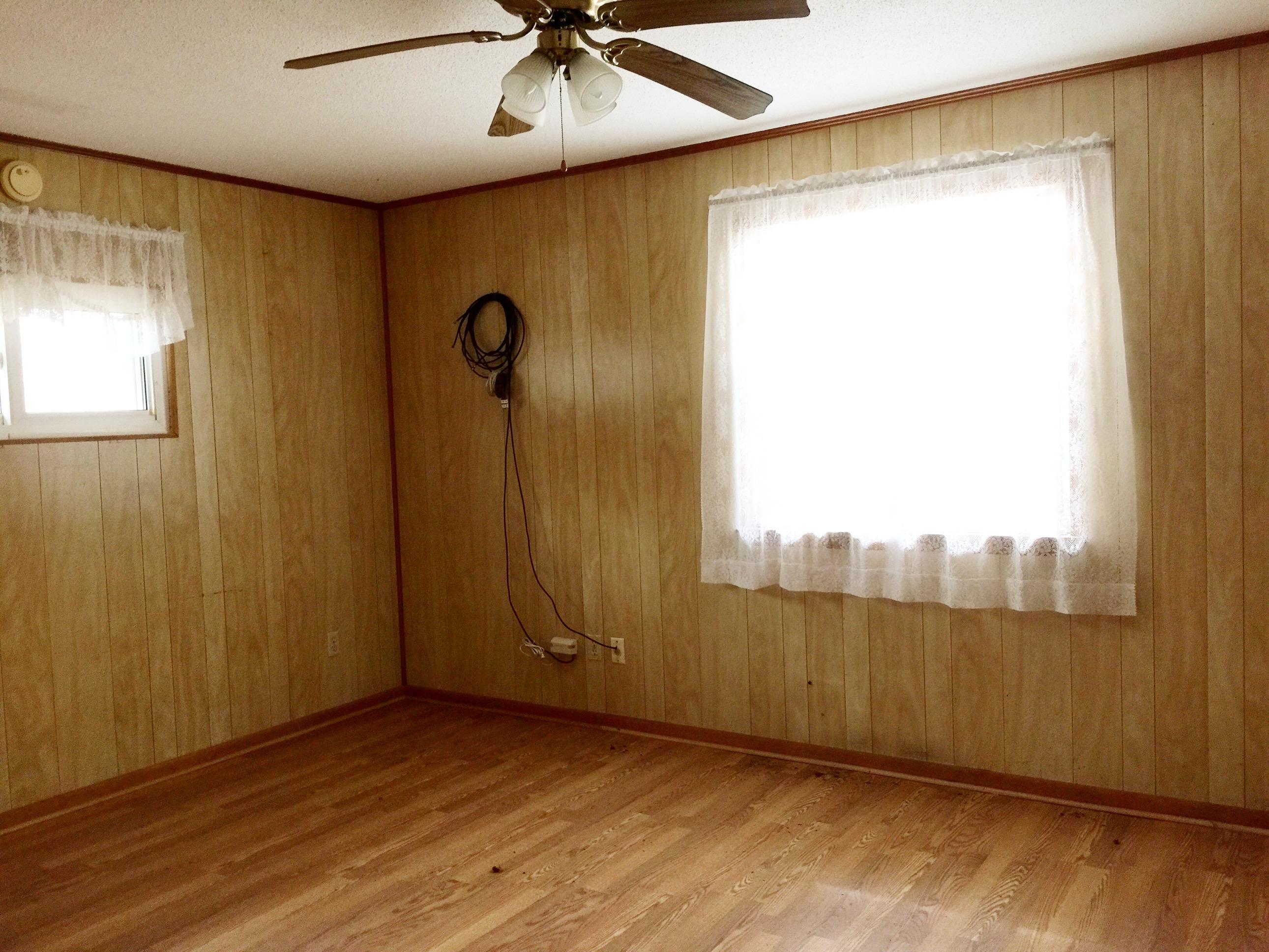 810 Sexton Road DeFuniak Springs, FL 32433 - Photo 4 of 21 a view of an empty room with a window