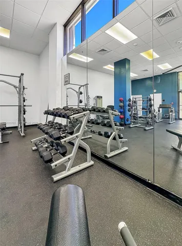 a view of a room with gym equipment