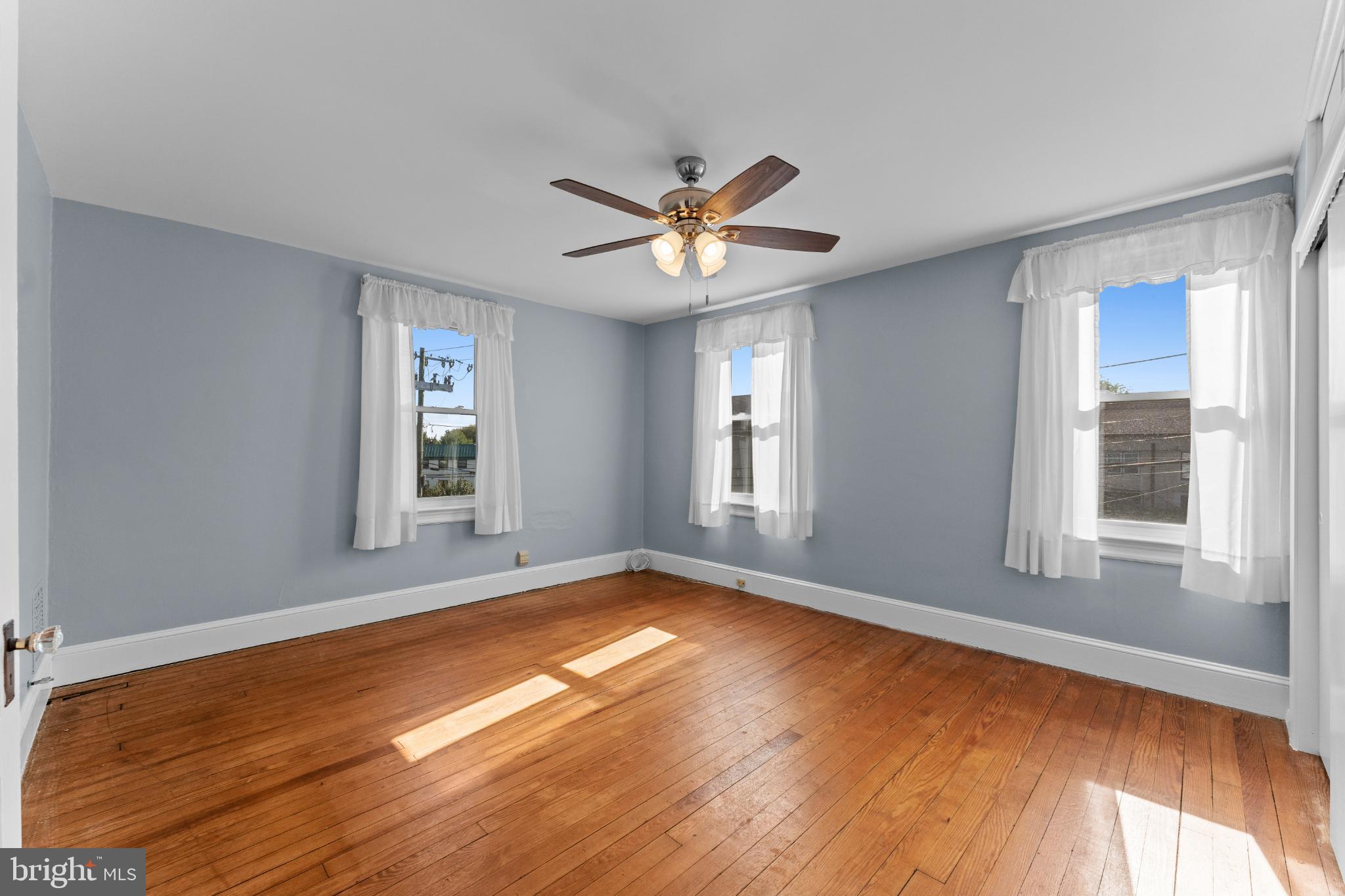 310 Dallas Road Willow Grove, PA 19090 - Photo 16 of 30 a view of empty room with wooden floor and fan