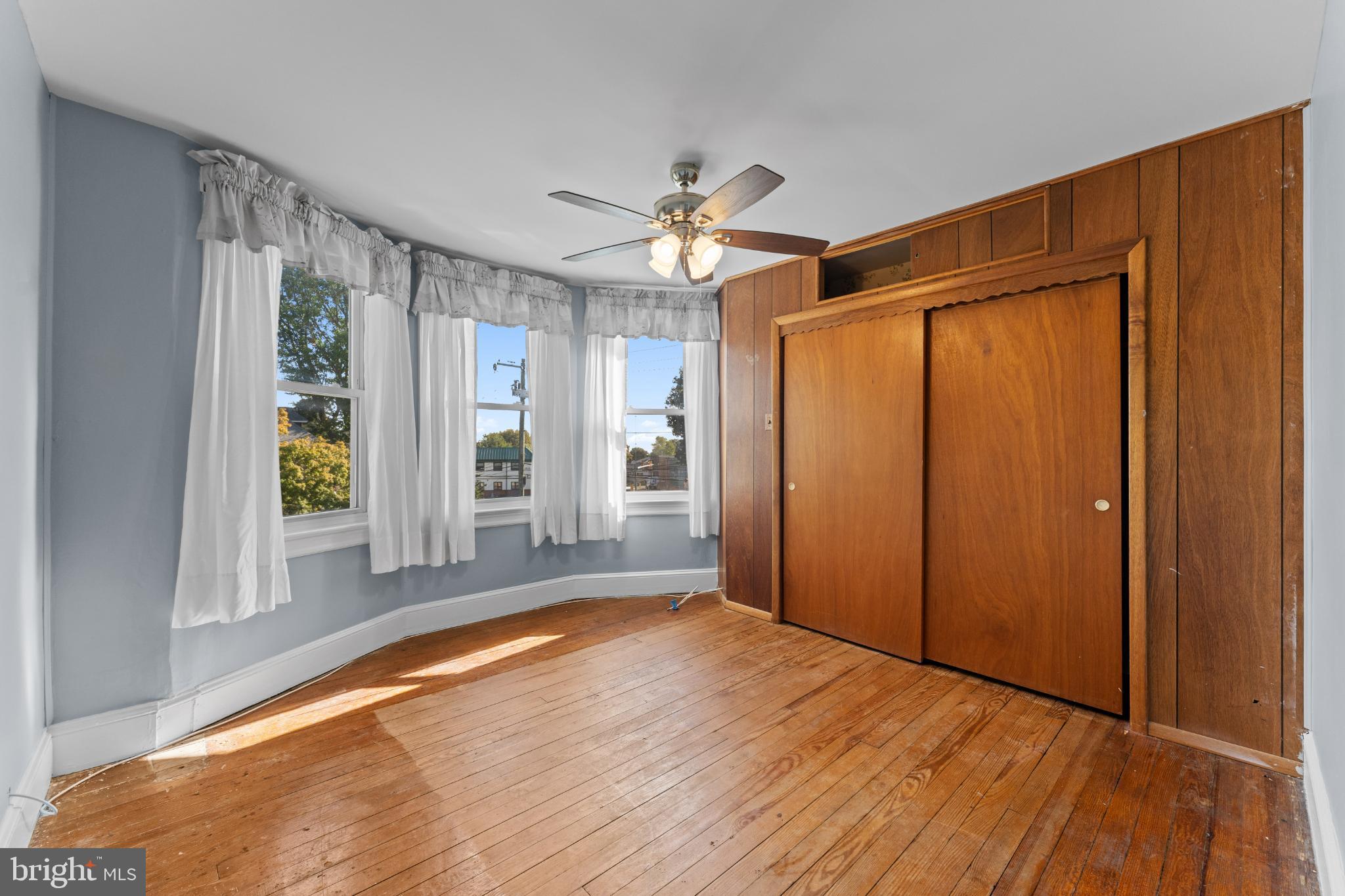 310 Dallas Road Willow Grove, PA 19090 - Photo 18 of 30 a view of an empty room with window and wooden floor