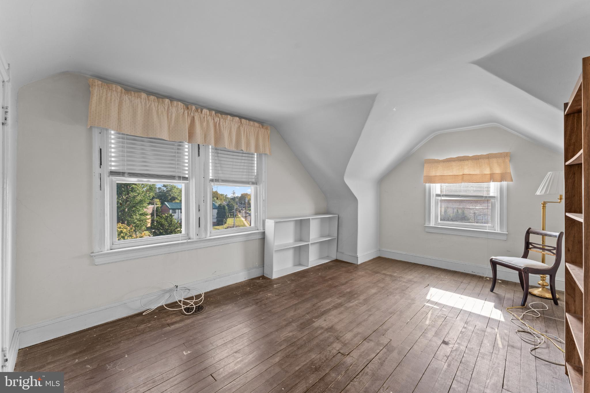 310 Dallas Road Willow Grove, PA 19090 - Photo 22 of 30 an empty room with wooden floor and windows