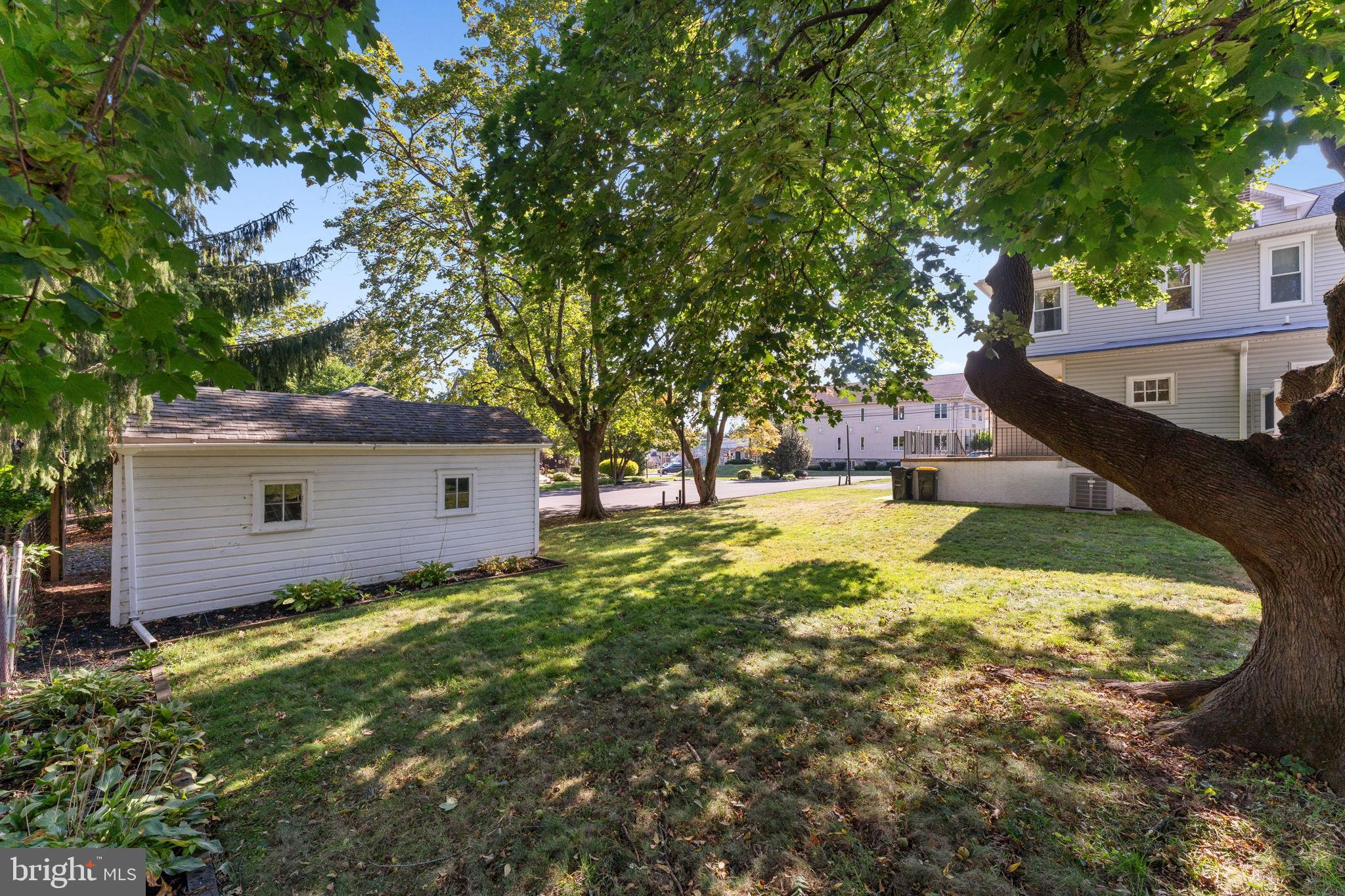 310 Dallas Road Willow Grove, PA 19090 - Photo 27 of 30 a backyard of a house with yard and garage
