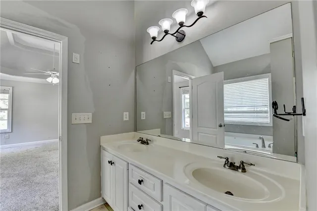 an empty room with a empty space and windows