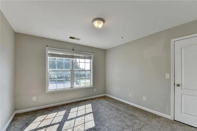 a view of a park with swings