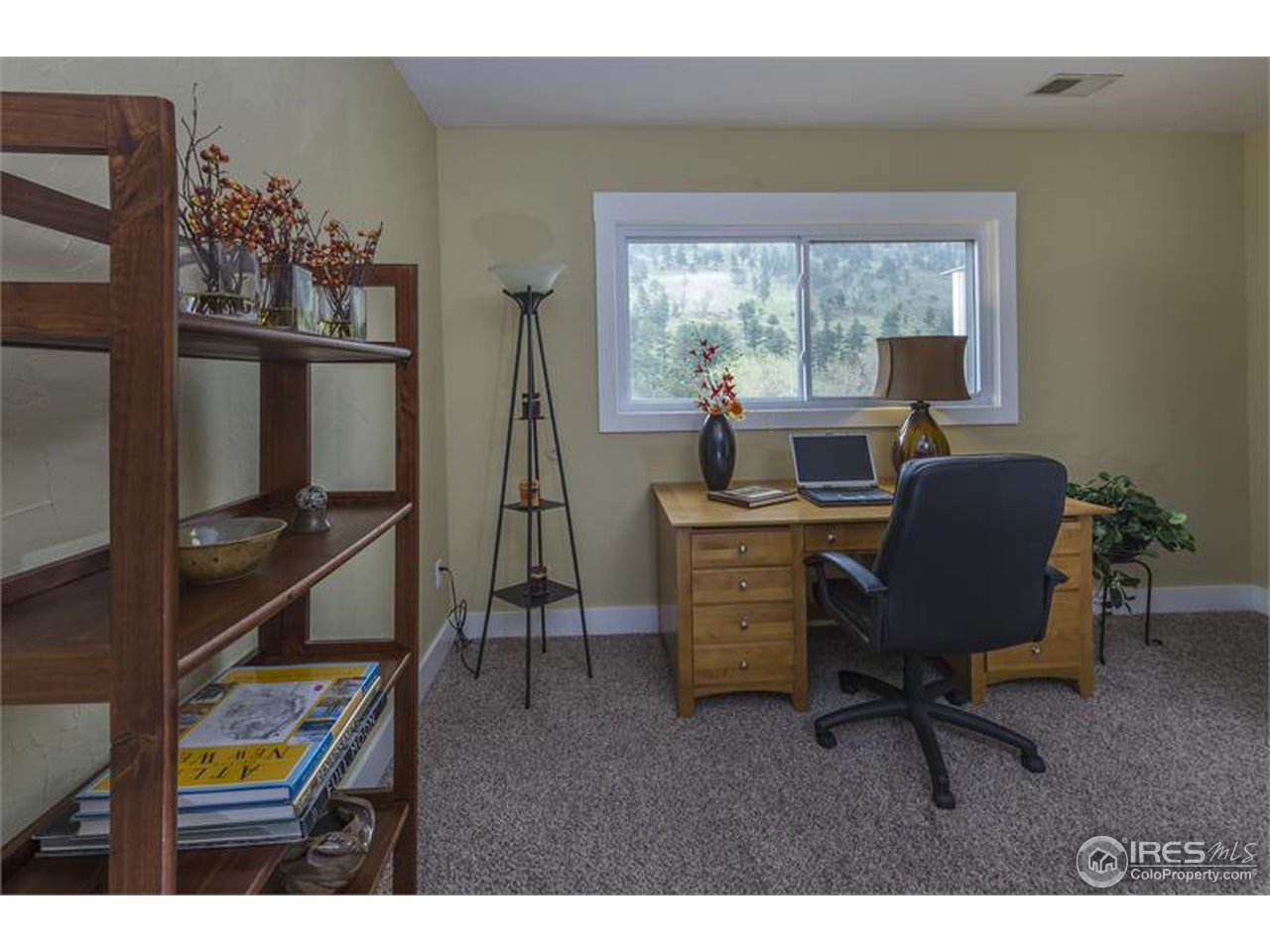 6909 Olde Stage Road Boulder, CO 80302 - Photo 14 of 23 a living room with furniture and a window