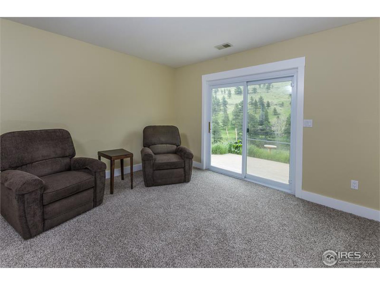 6909 Olde Stage Road Boulder, CO 80302 - Photo 15 of 23 a living room with furniture and a window