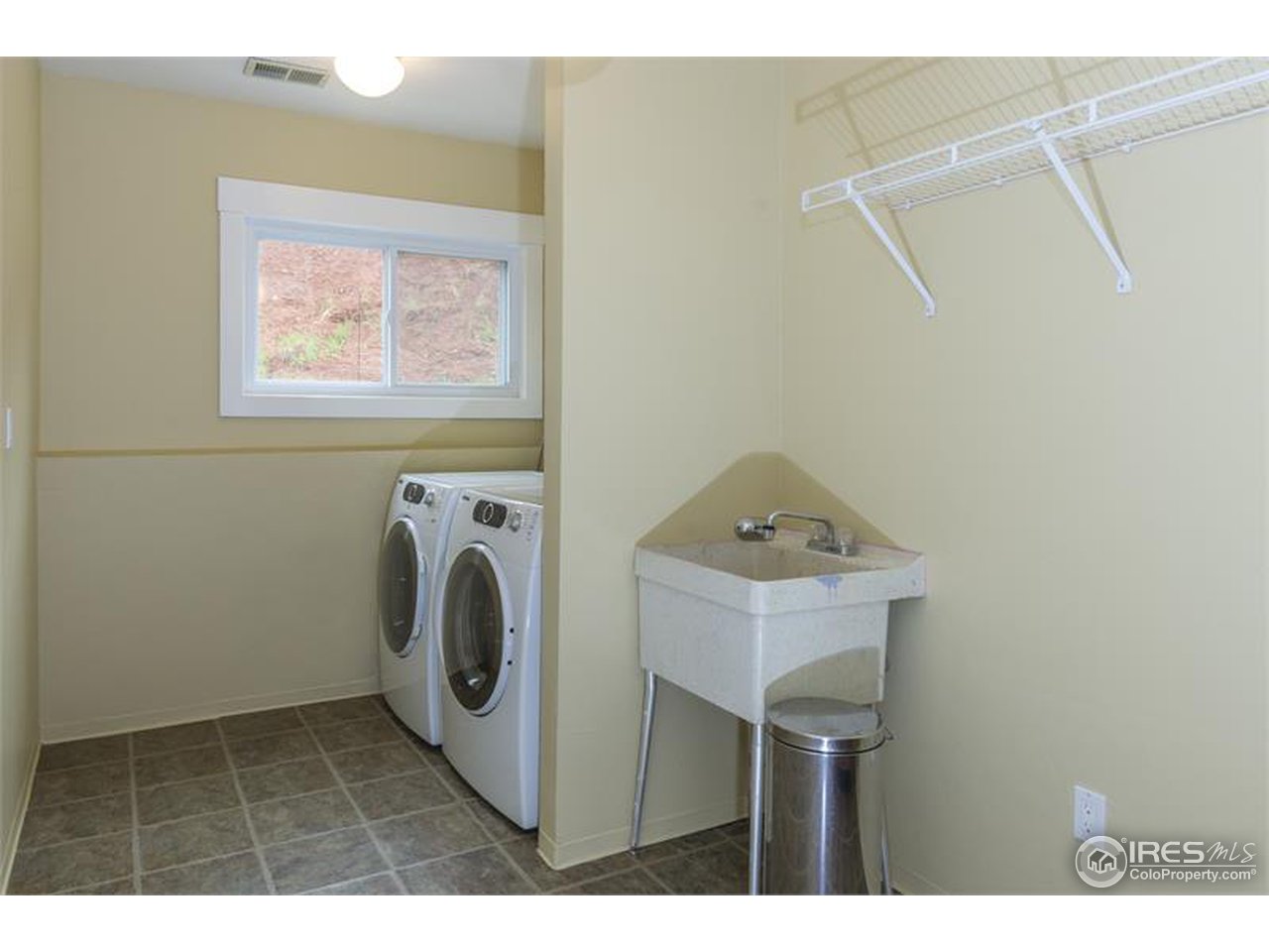 6909 Olde Stage Road Boulder, CO 80302 - Photo 17 of 23 a utility room with dryer and washer