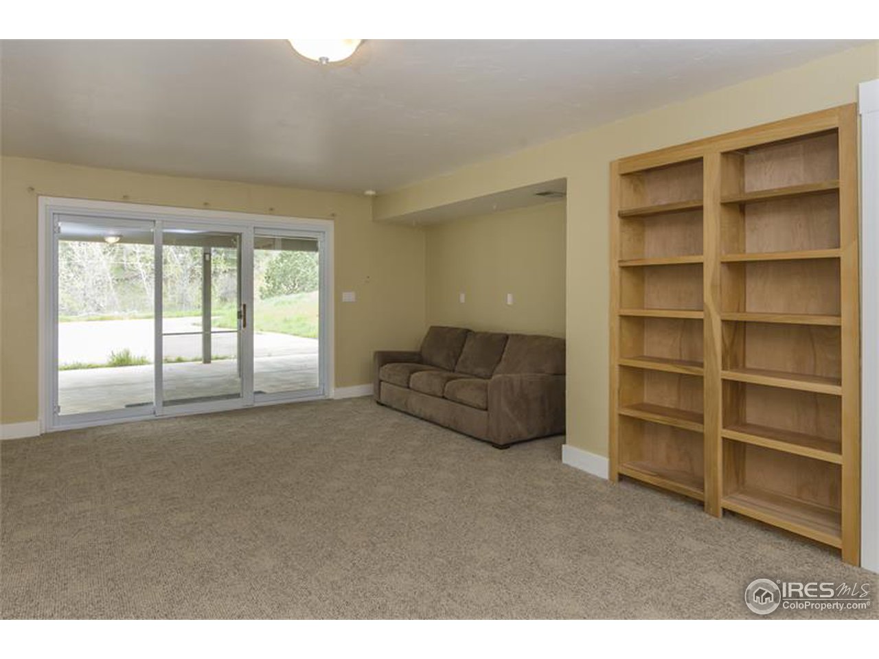 6909 Olde Stage Road Boulder, CO 80302 - Photo 18 of 23 a living room with furniture and a window