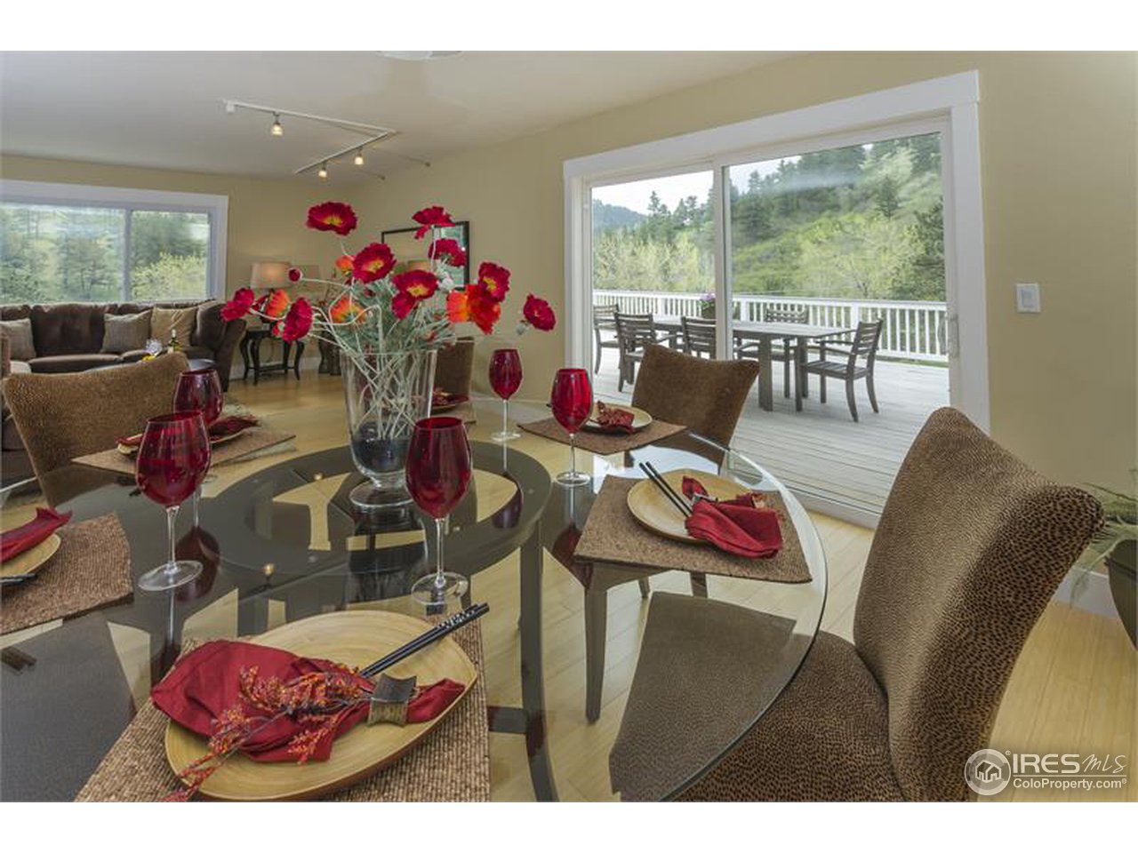 6909 Olde Stage Road Boulder, CO 80302 - Photo 4 of 23 a view of a dining room with furniture window and outside view