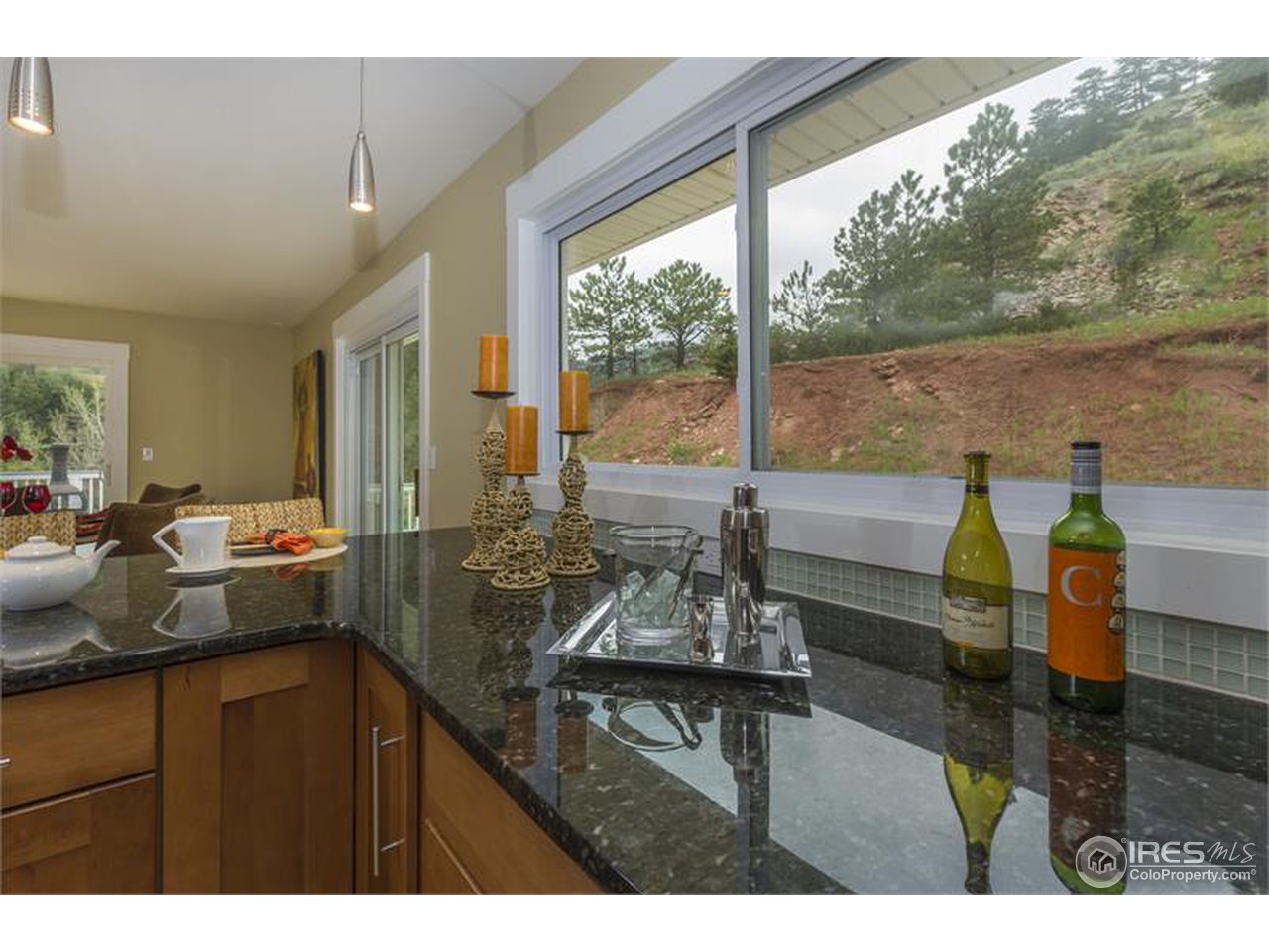 6909 Olde Stage Road Boulder, CO 80302 - Photo 6 of 23 a living room with furniture and a large window