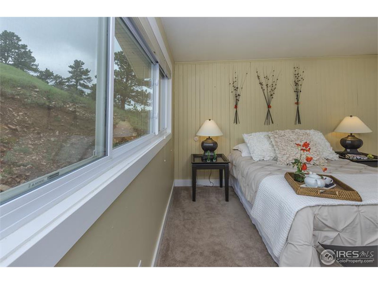 6909 Olde Stage Road Boulder, CO 80302 - Photo 8 of 23 a living room with furniture and a large window