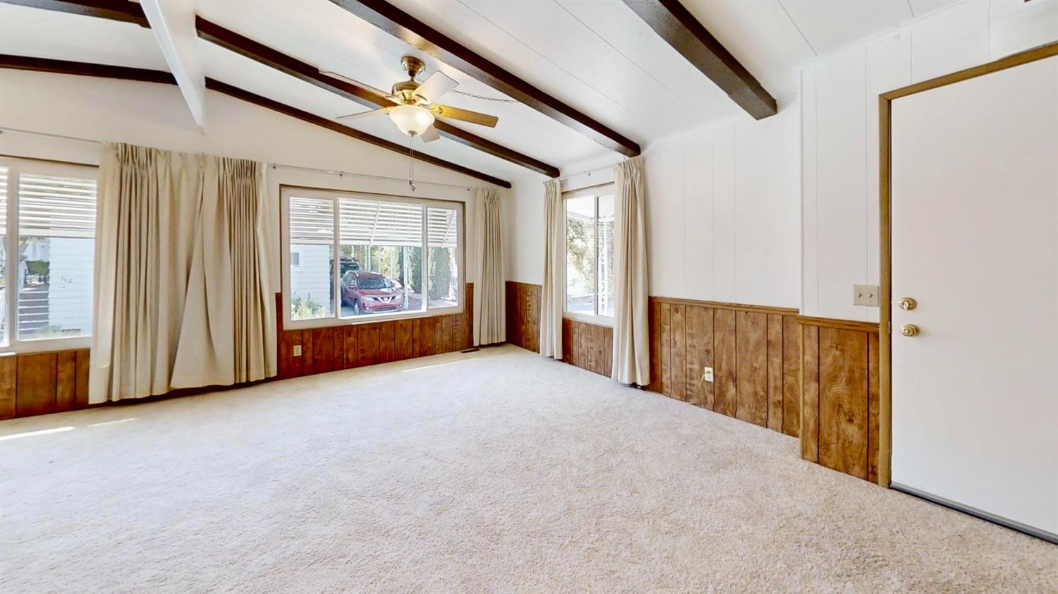 156 Rimma Way Roseville, CA 95661 - Photo 3 of 24 a view of an empty room with a window