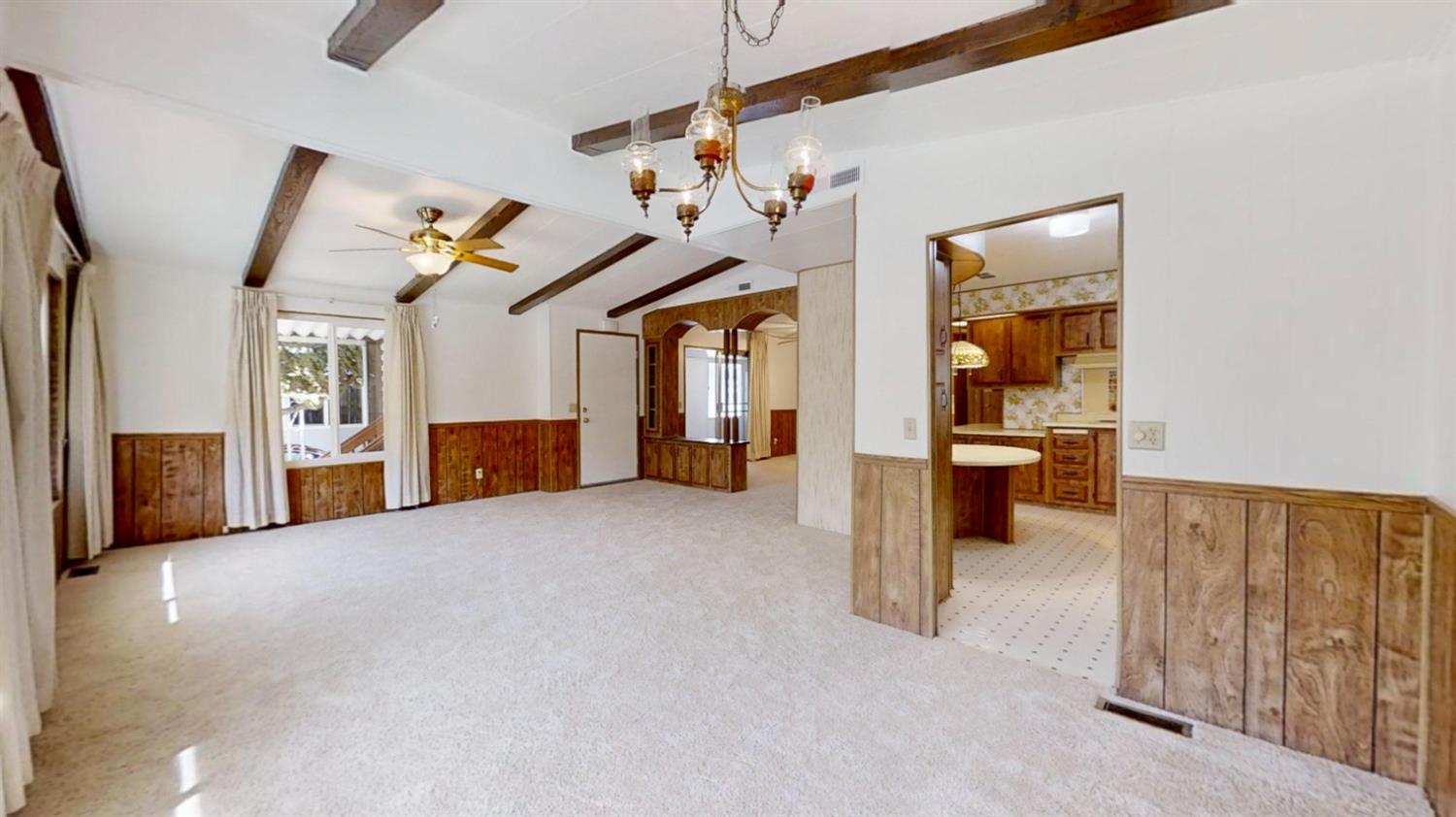 156 Rimma Way Roseville, CA 95661 - Photo 5 of 24 a view of a livingroom with furniture and a ceiling fan